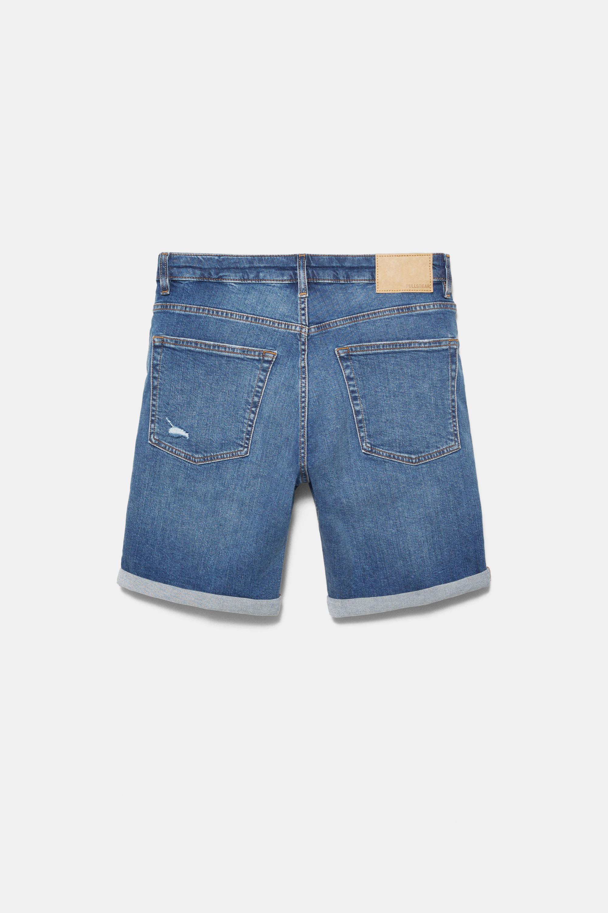 Ripped denim Bermuda shorts — Medium blue