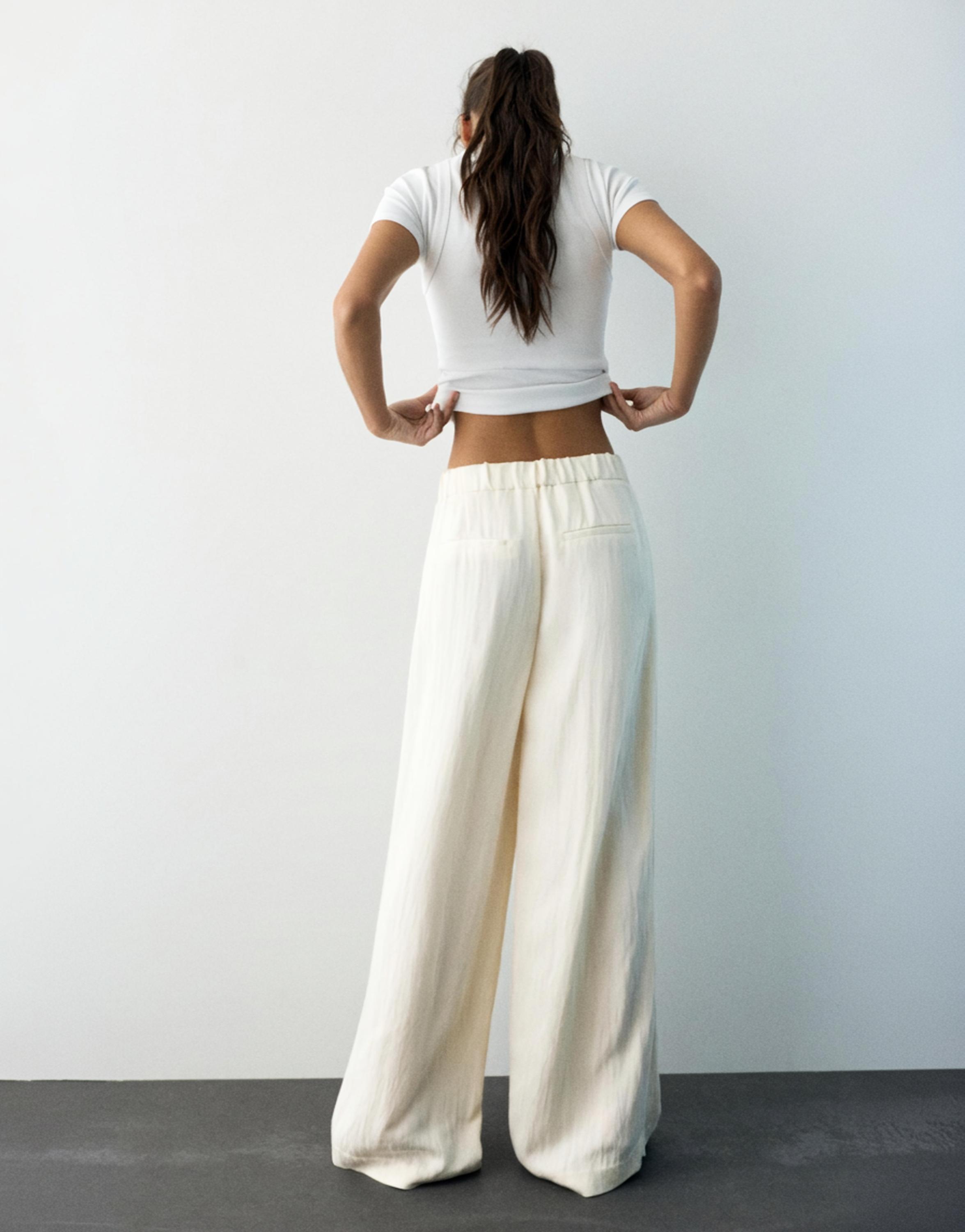 Düğmeli ve fermuarlı, kemer tokalı, önü pensli, elastik belli, tailored fit pantolon. - Görsel 24