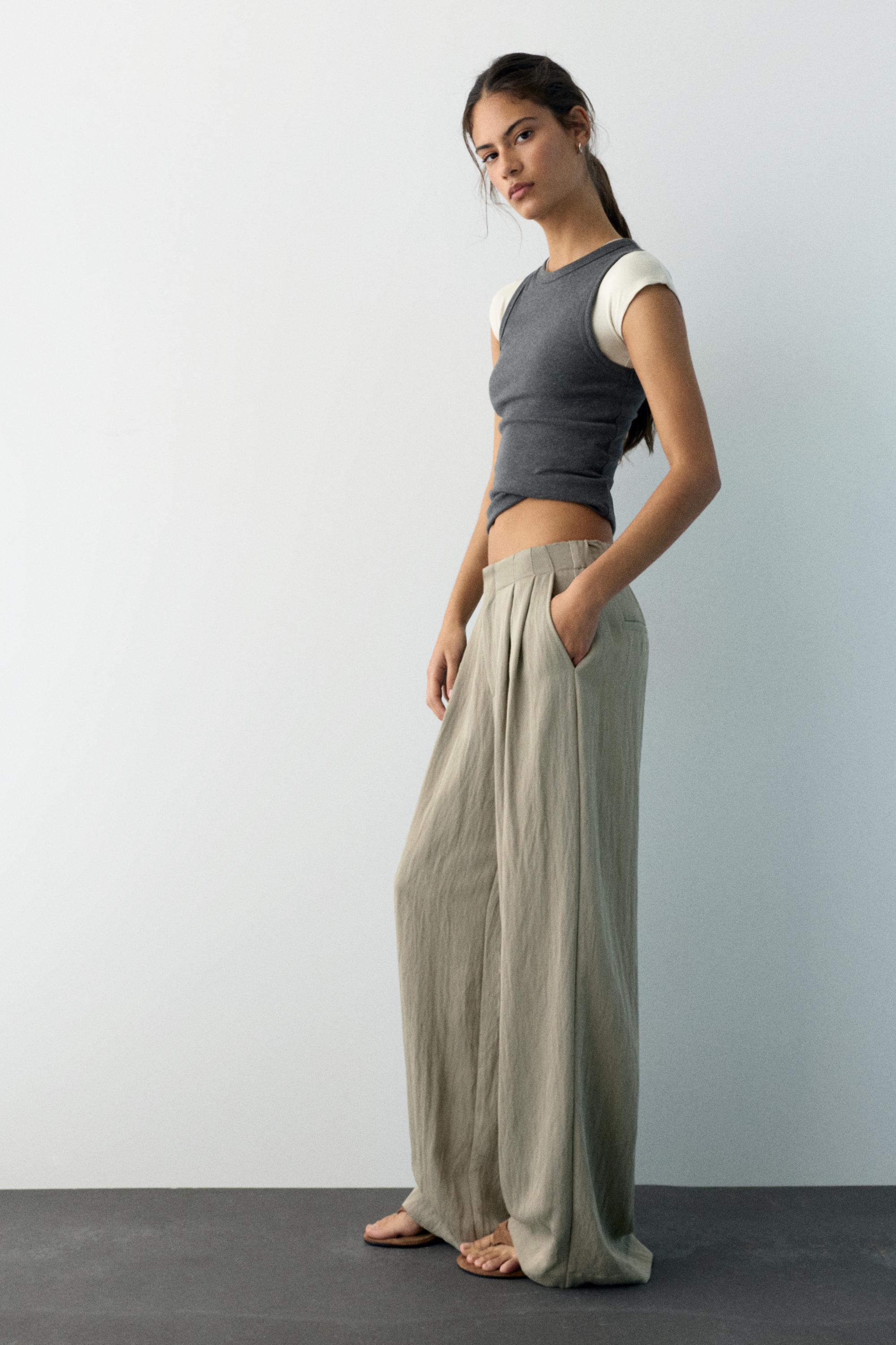 Düğmeli ve fermuarlı, kemer tokalı, önü pensli, elastik belli, tailored fit pantolon. - Görsel 42