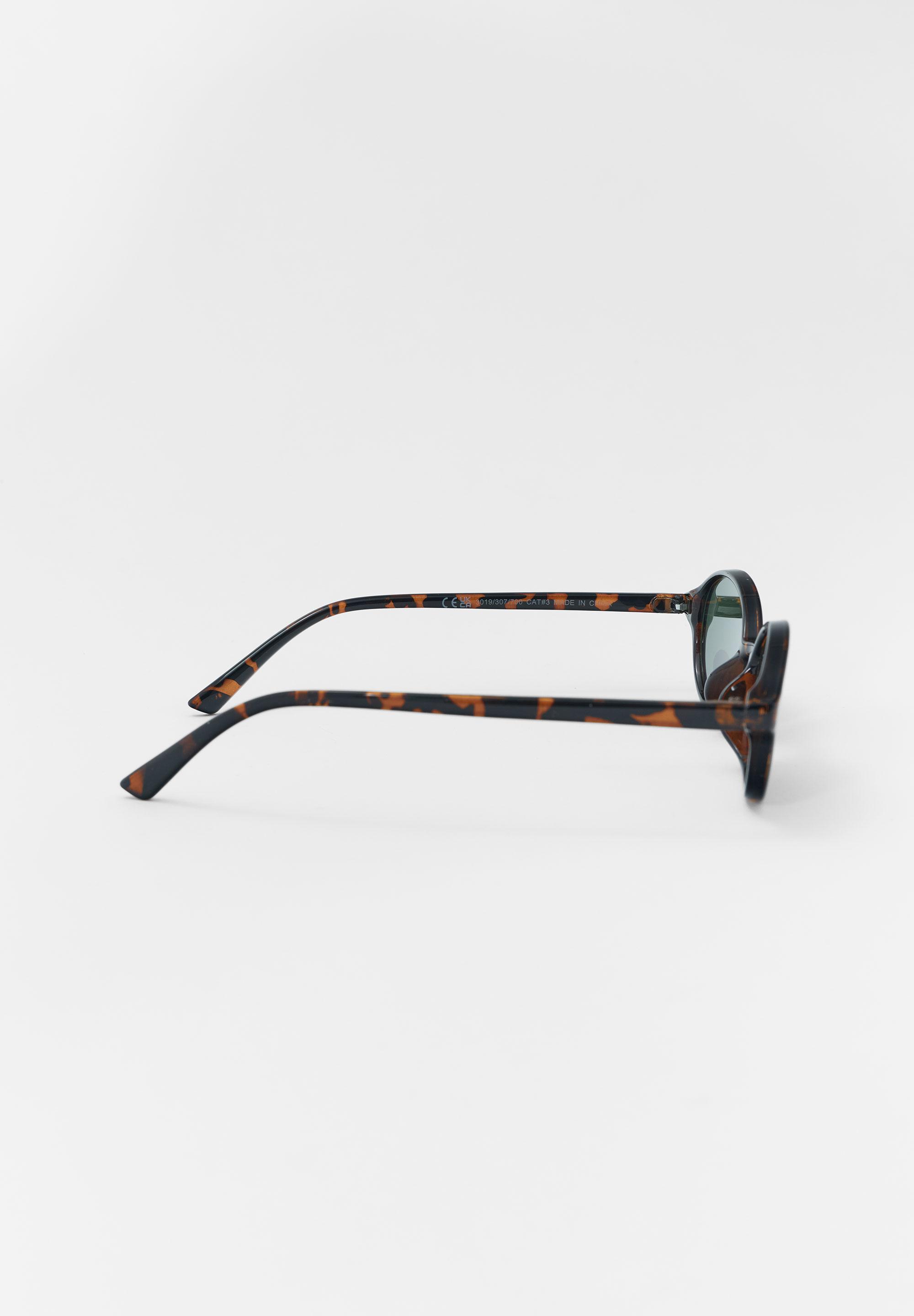 Resin oval sunglasses — Brown