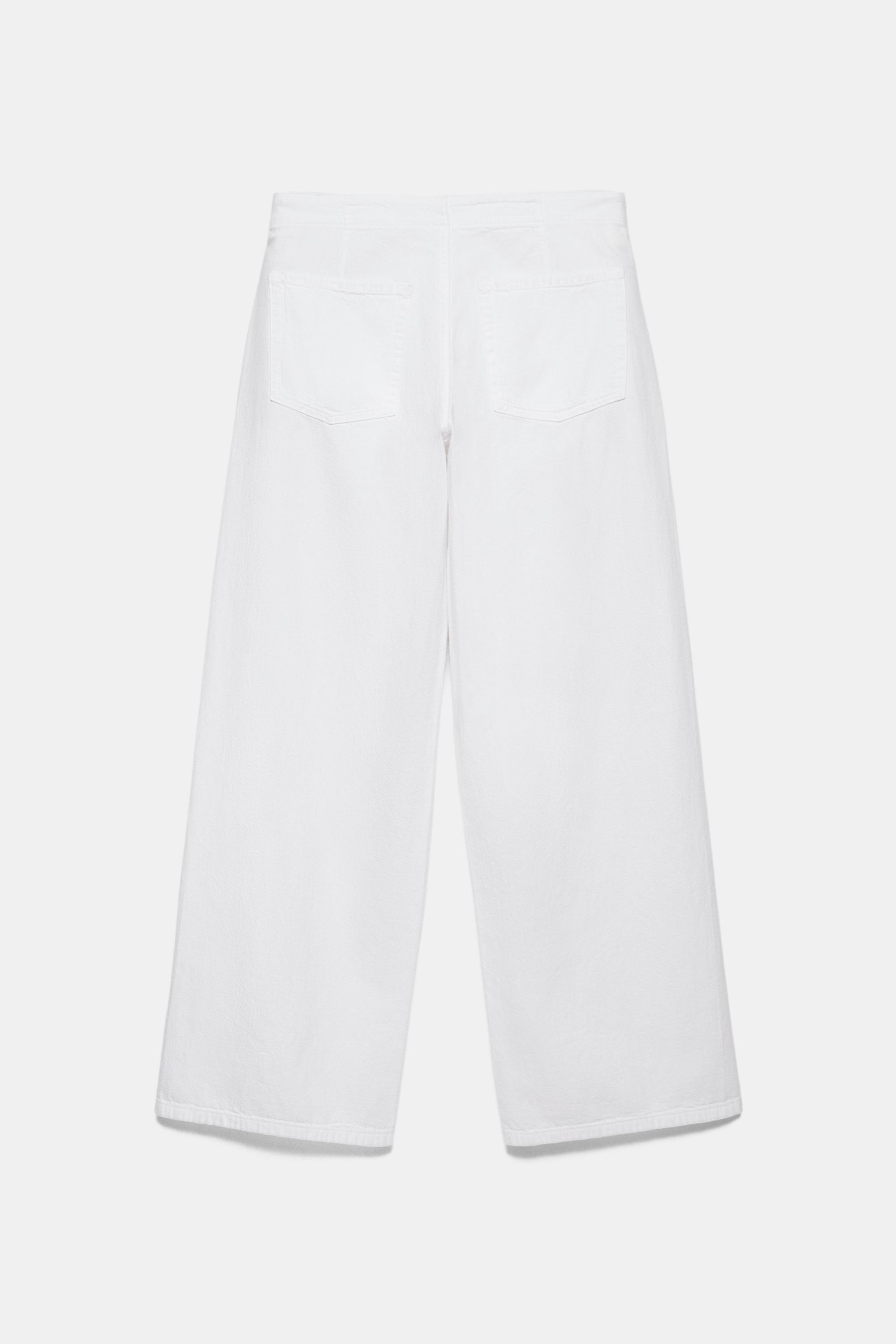 Straight-leg jeans with eyelets — White