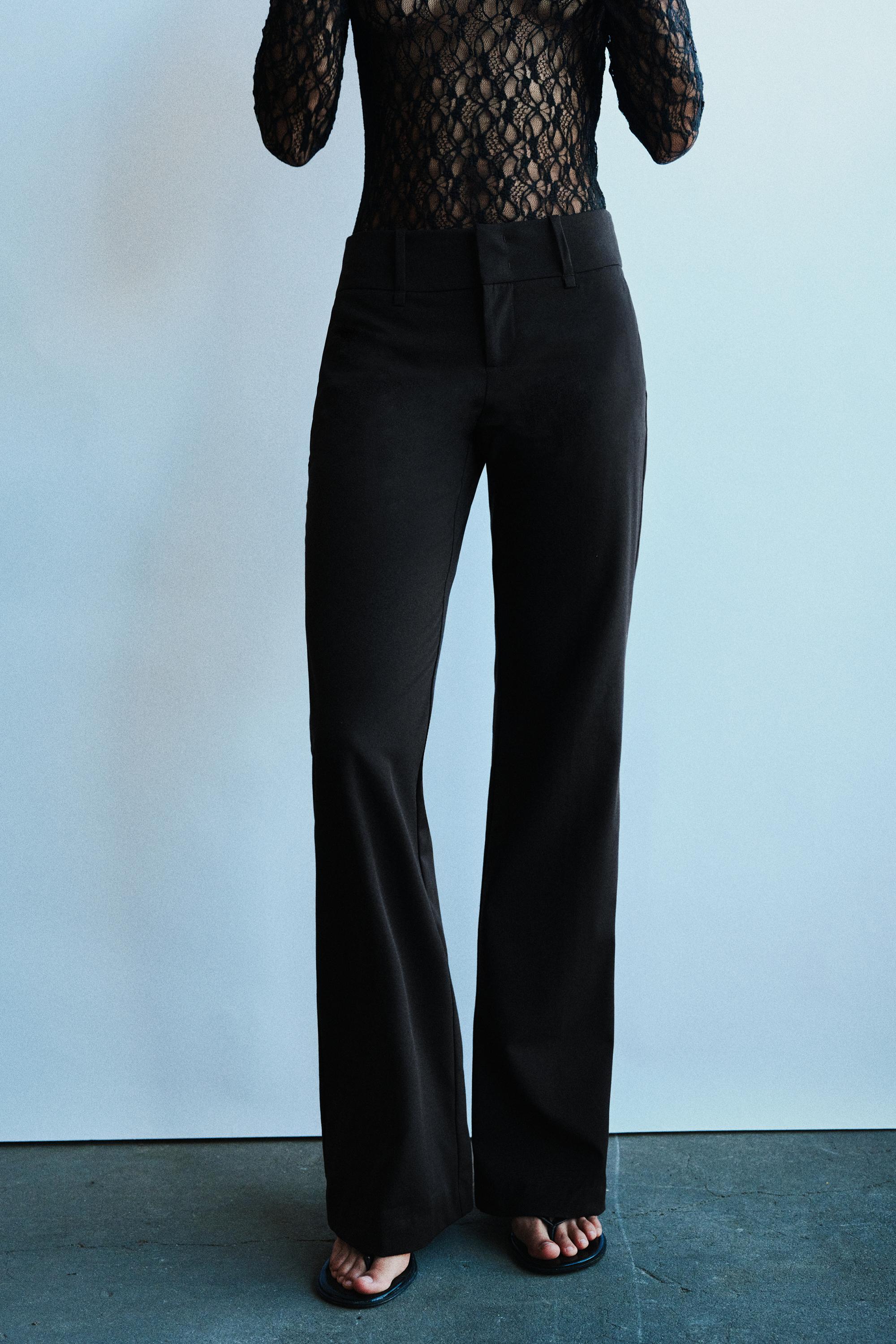 Flared trousers with belt loops — Black