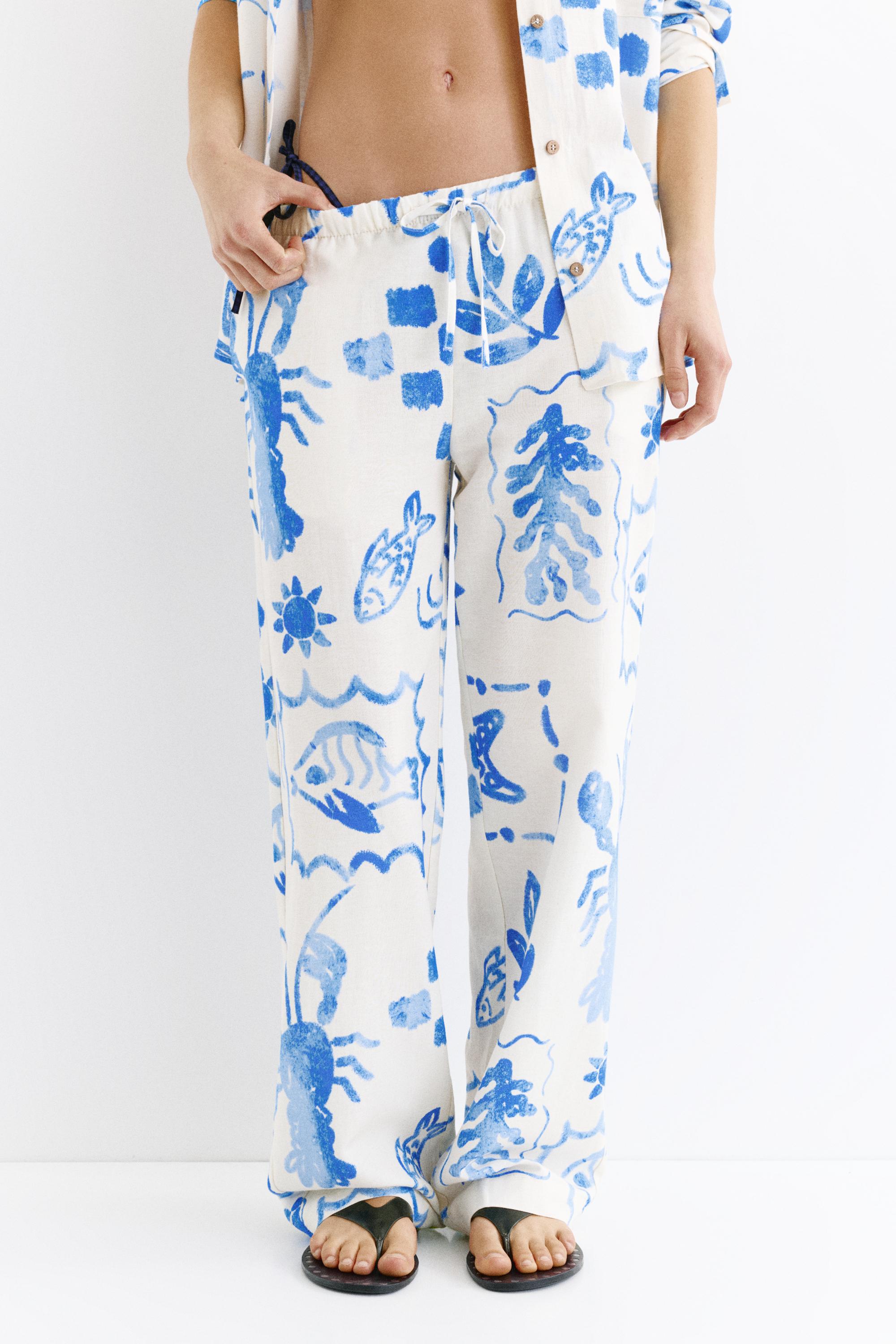 Marine printed flowing trousers — Sand