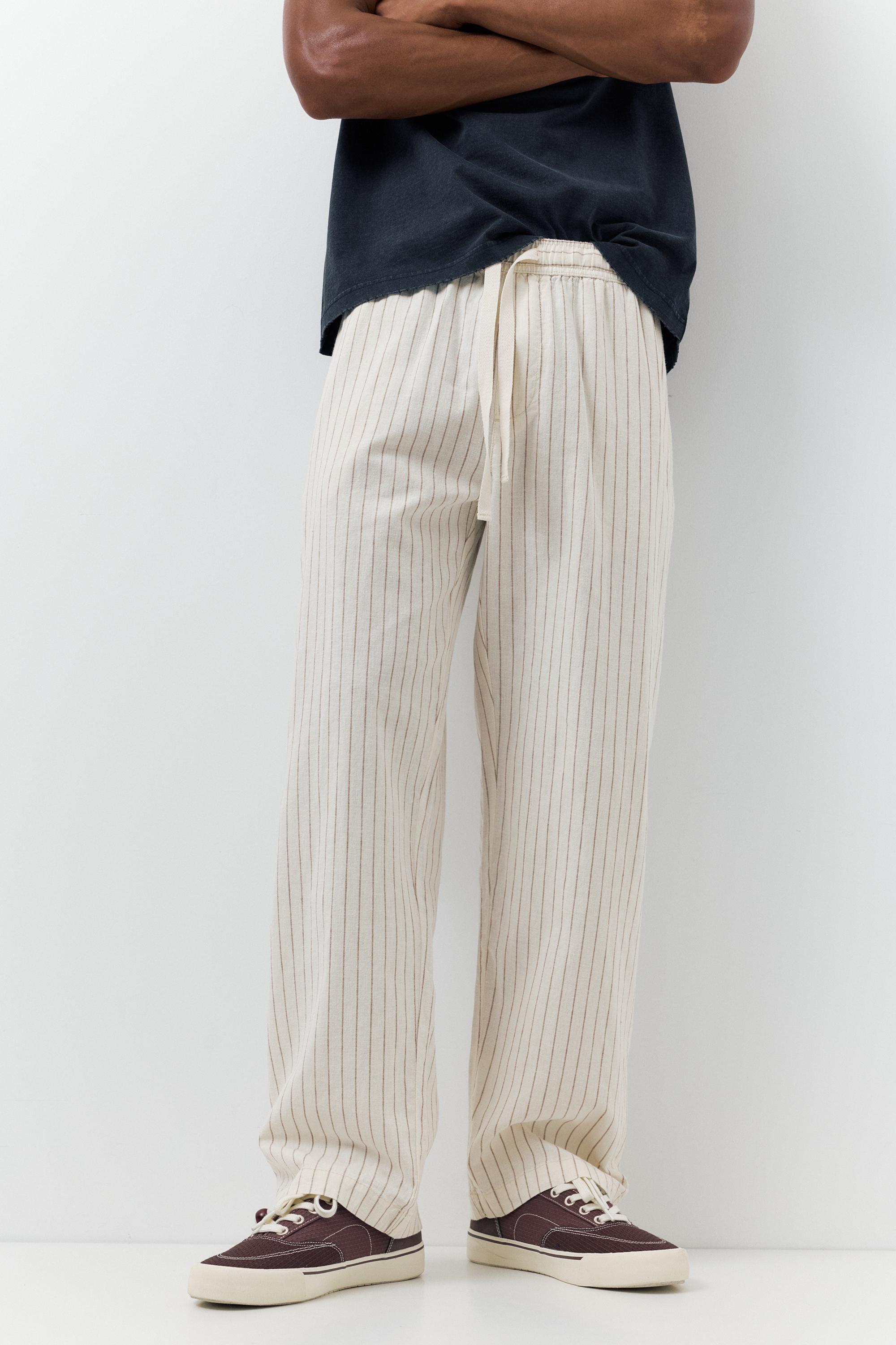 Linen blend jogger trousers — Striped