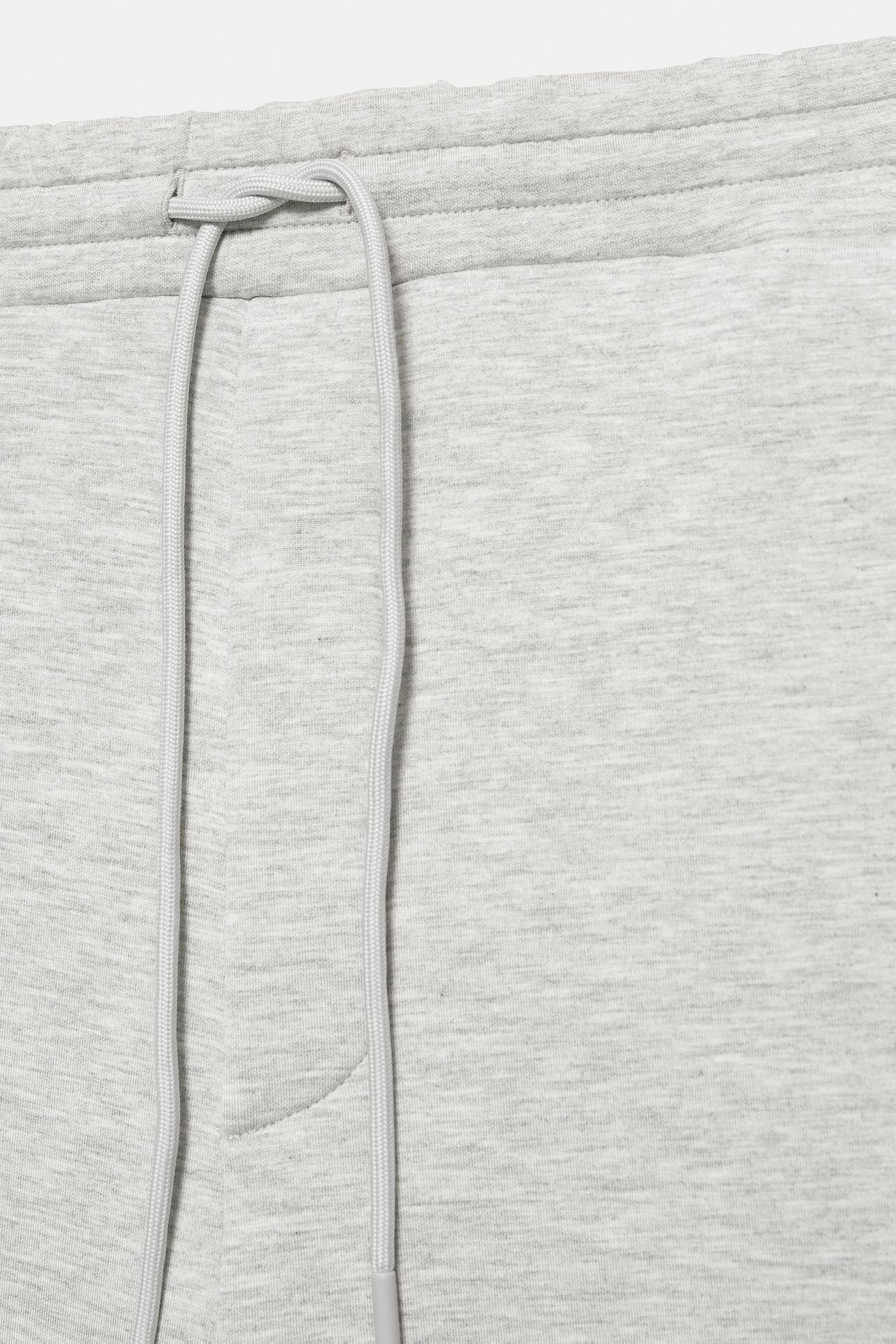 Neoprene-effect baggy trousers — Grey marl