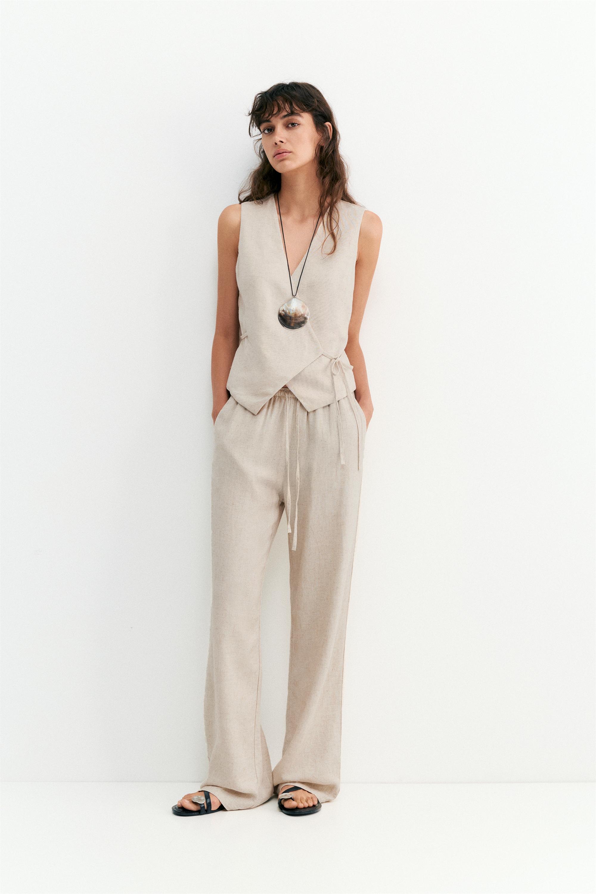 Flowy trousers with linen — Beige