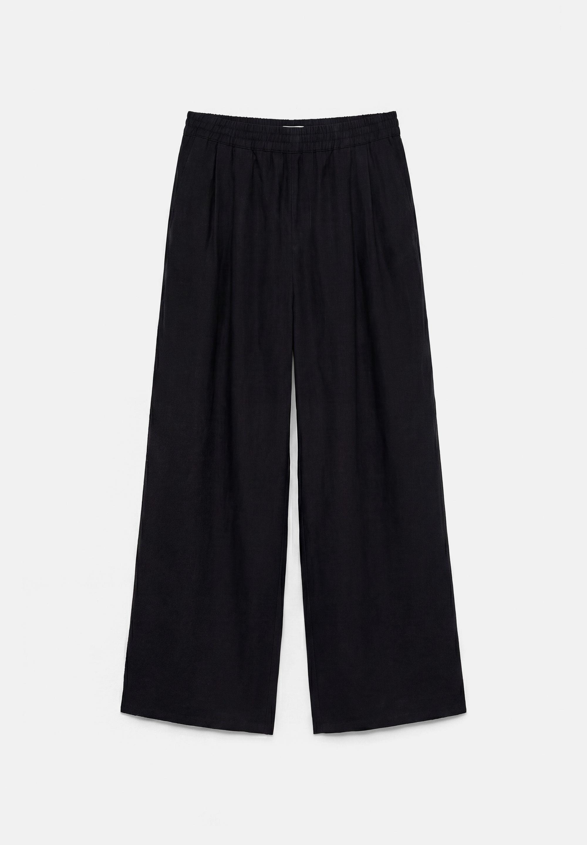 Flowing darted trousers — Black