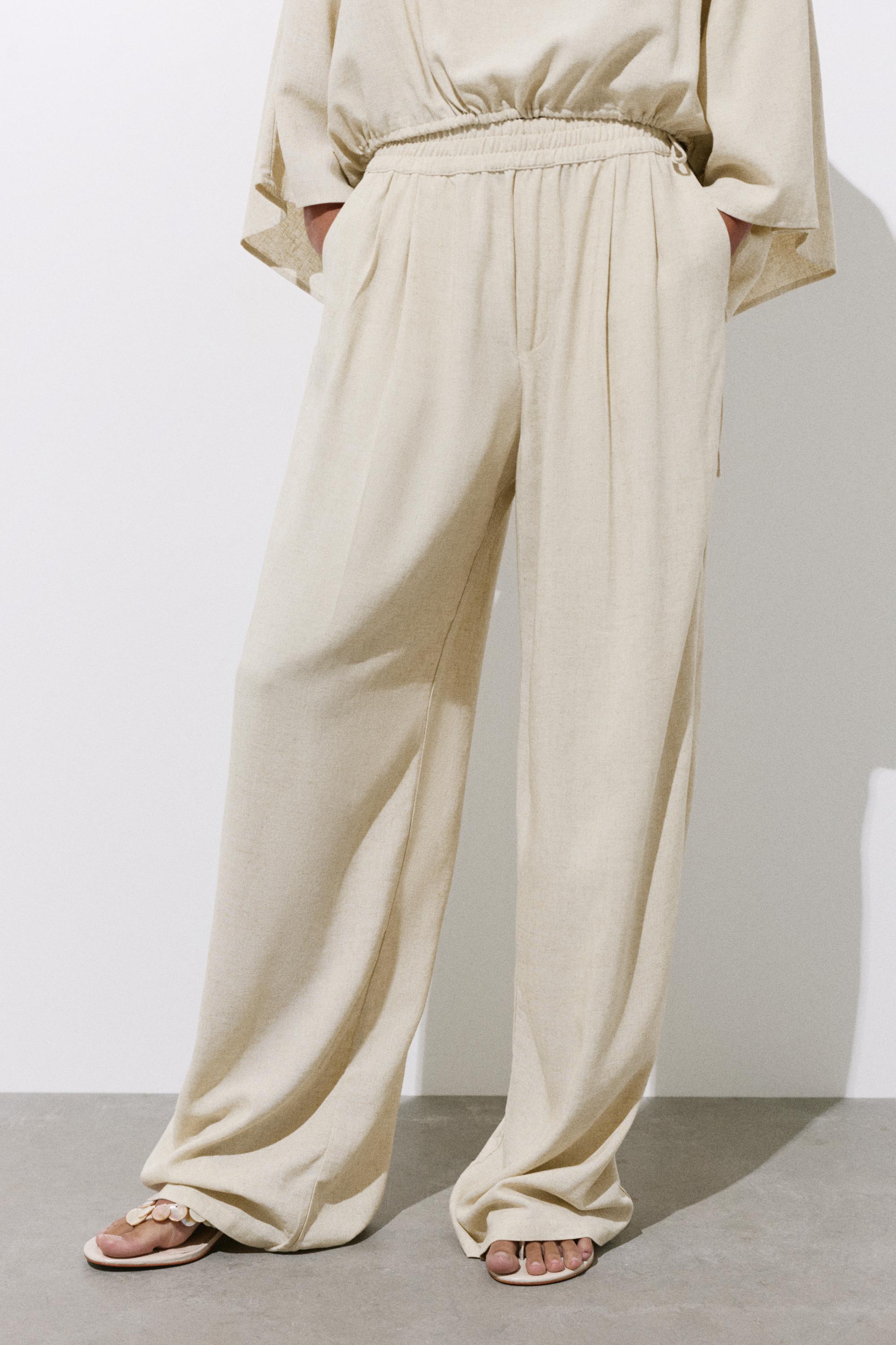Flowing darted trousers — Sand