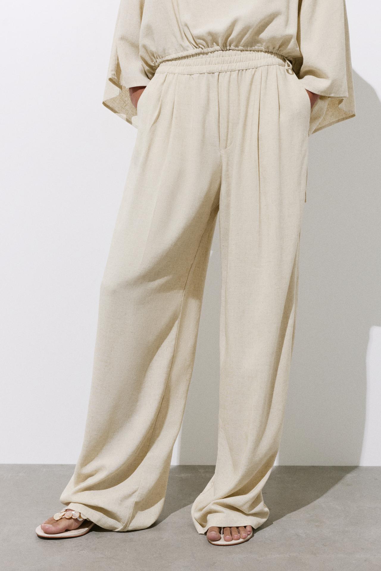 Flowing darted trousers — Sand