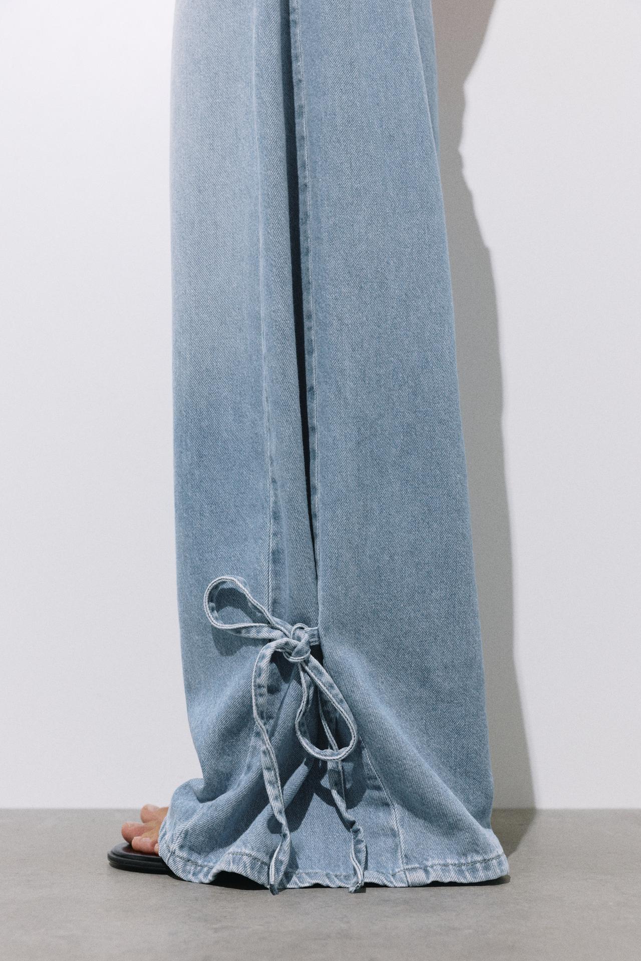 Wide-leg jeans with bows — Pale blue