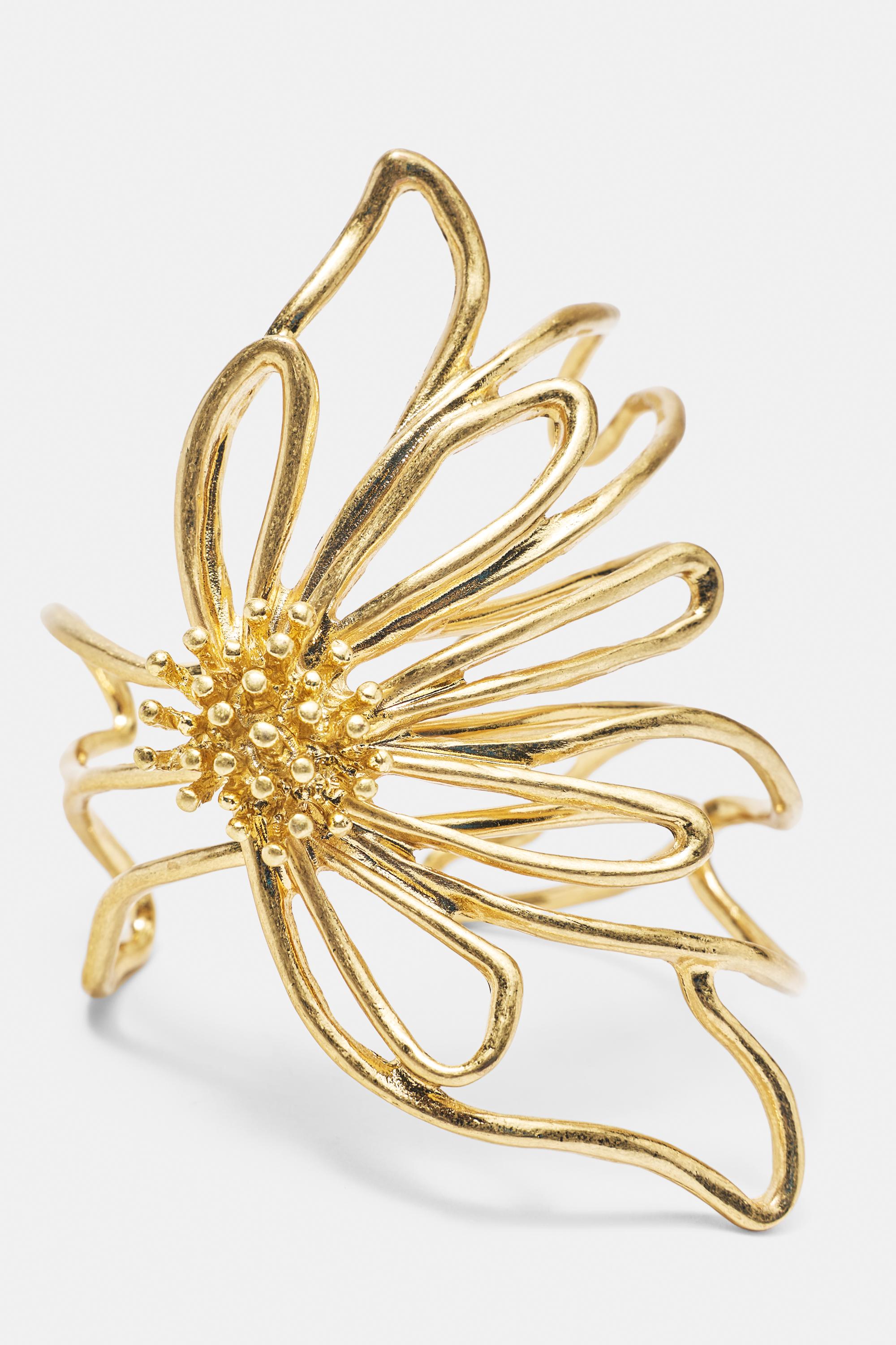 Floral rigid bracelet — Gold