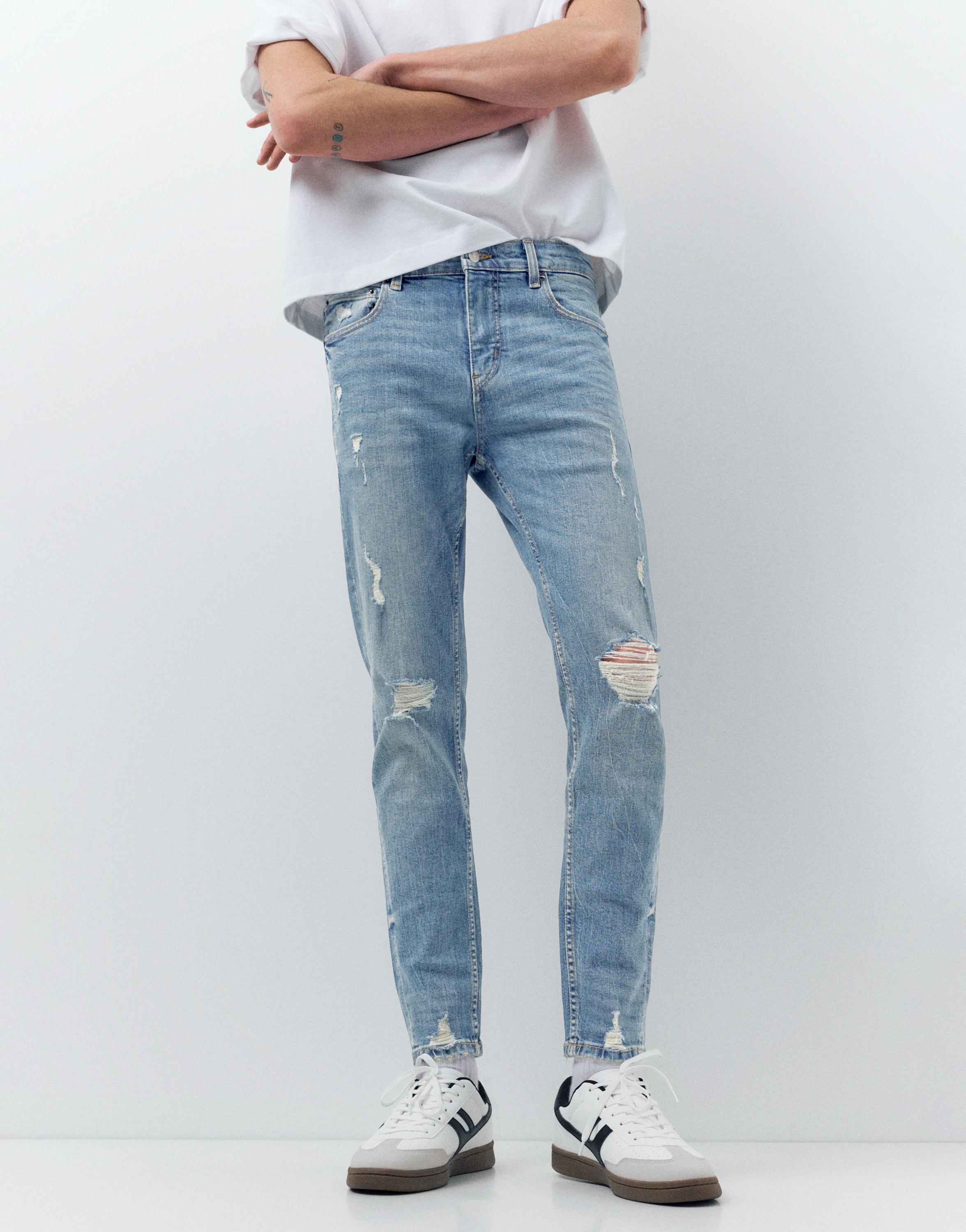 Ripped skinny jeans — Medium blue
