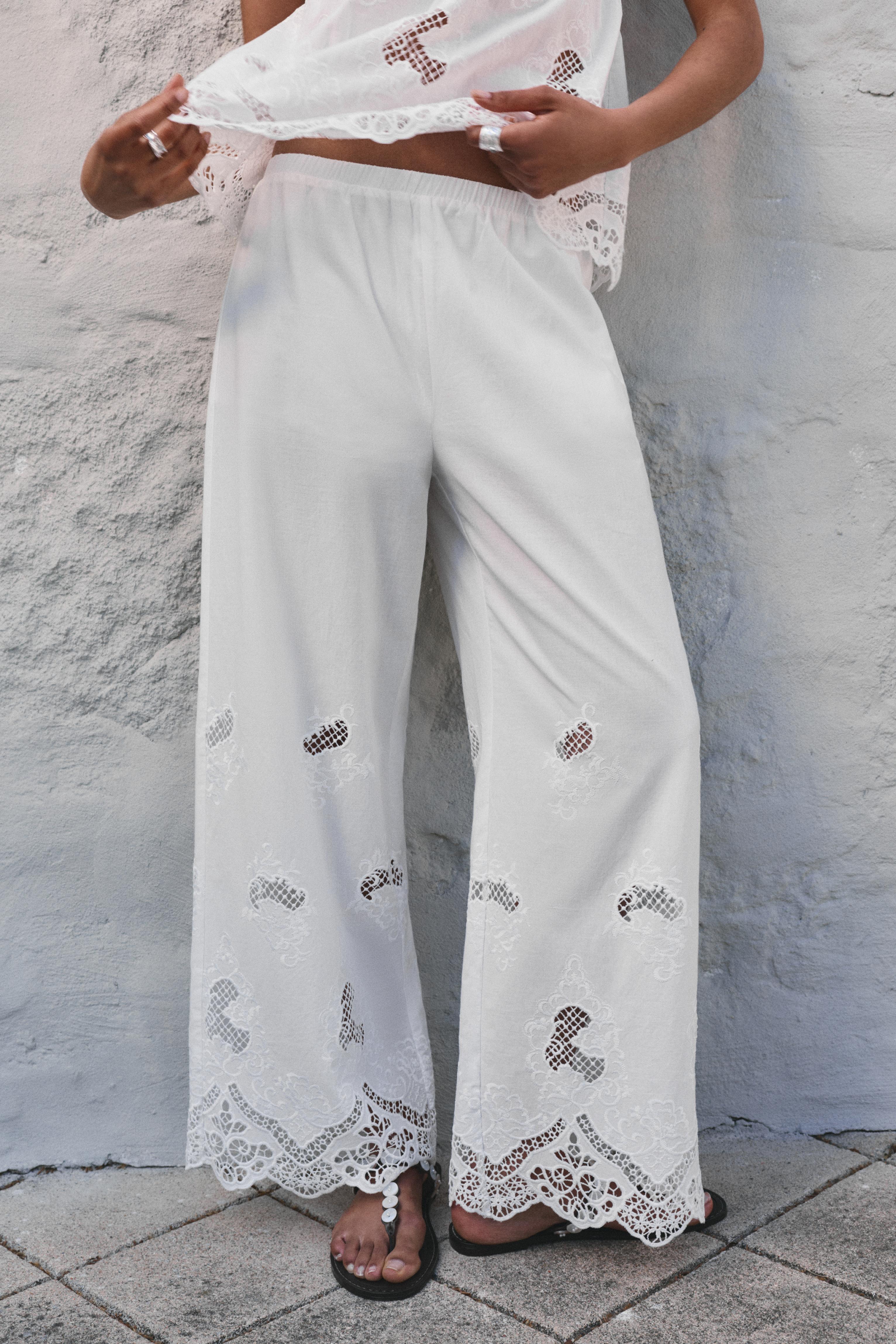 White trousers with Swiss embroidery — White
