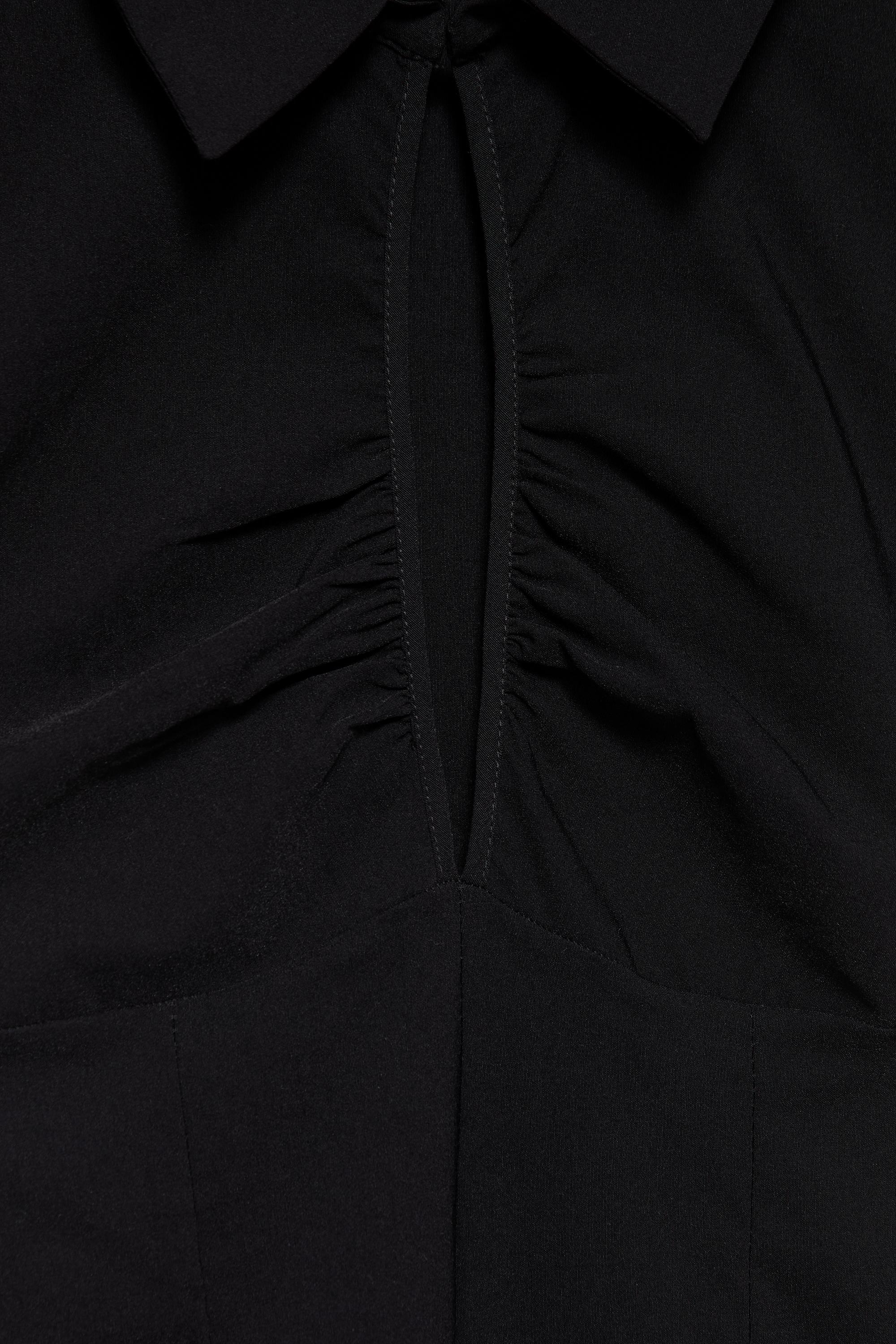 Short sleeve cut-out top — Black