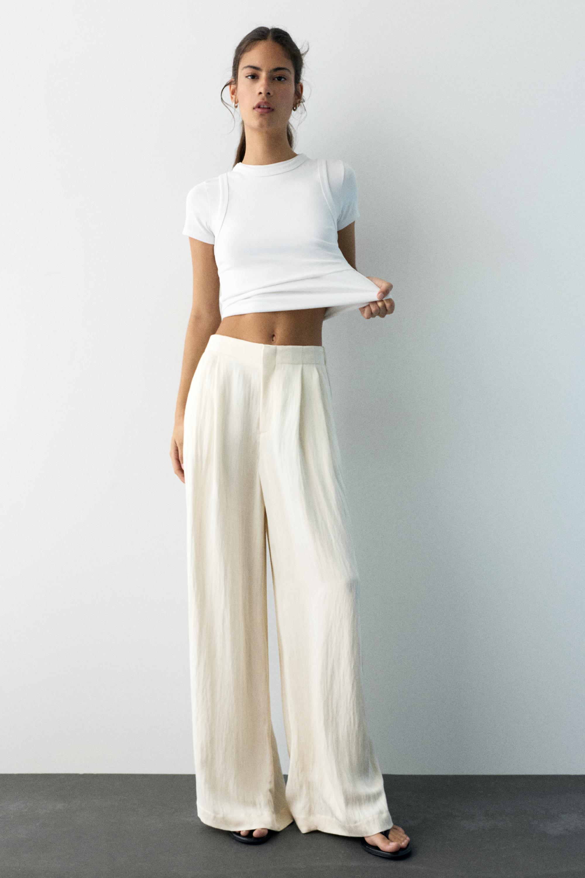 Düğmeli ve fermuarlı, kemer tokalı, önü pensli, elastik belli, tailored fit pantolon. - Görsel 28