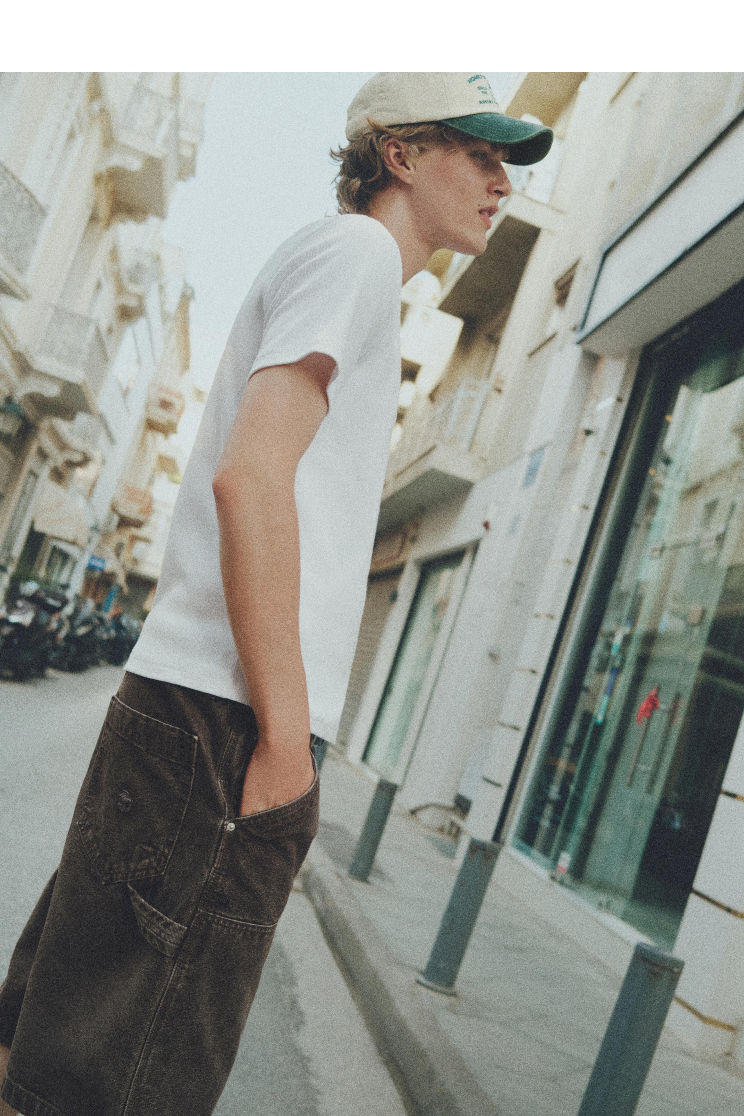 Short sleeve zip-up polo shirt — Off white