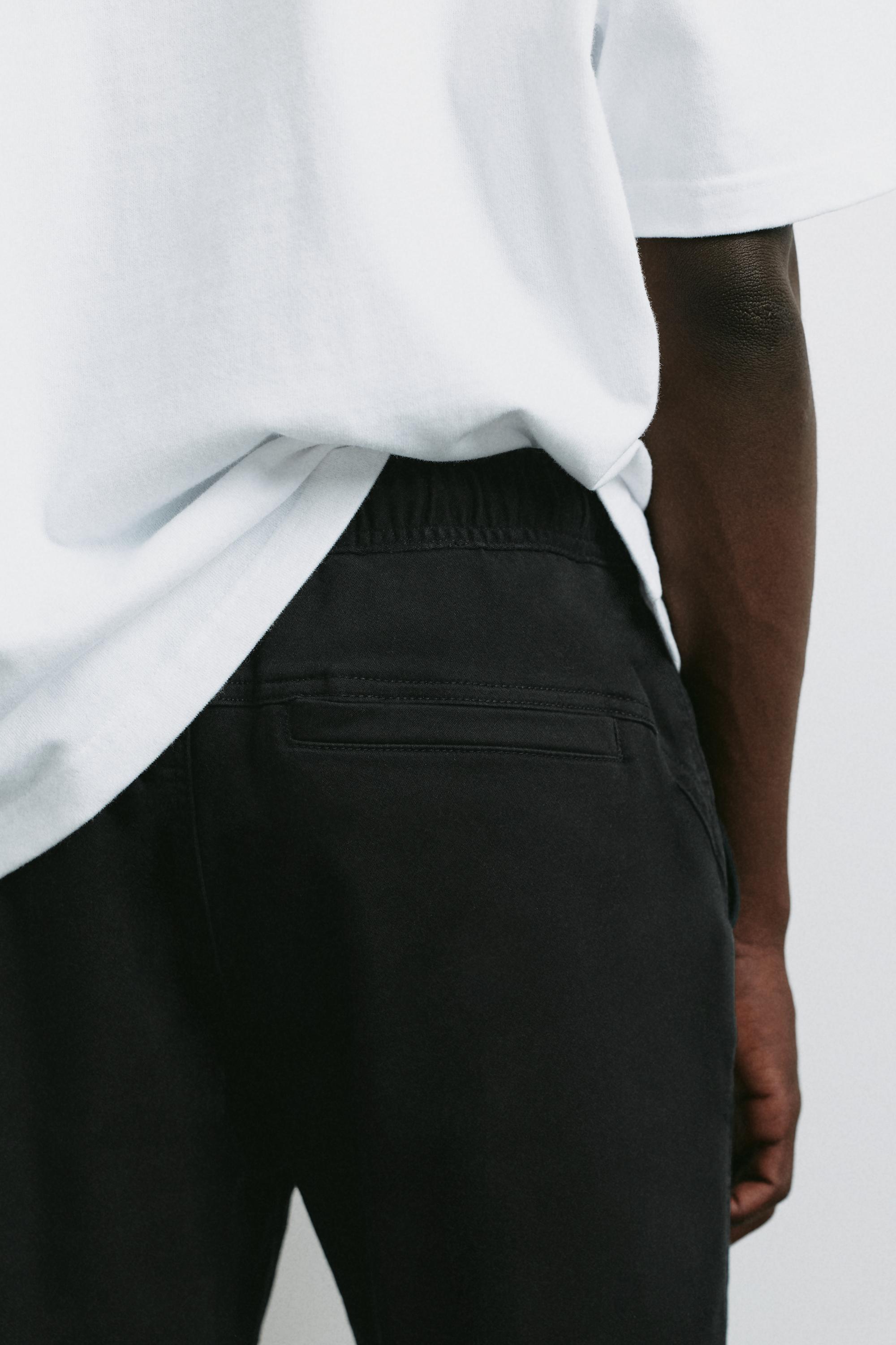Regular fit jogging trousers — Black
