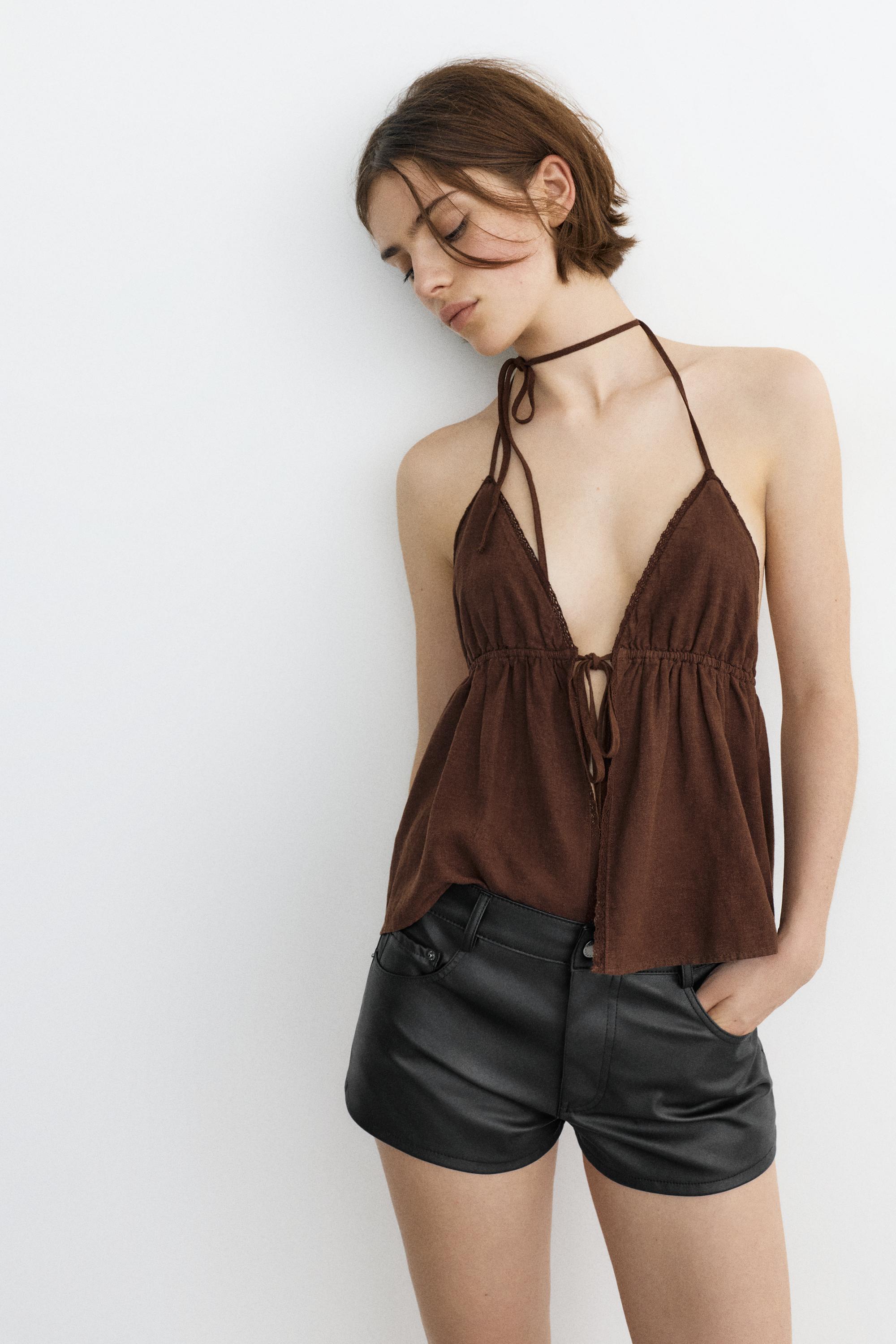 Studded faux leather mini shorts — Black