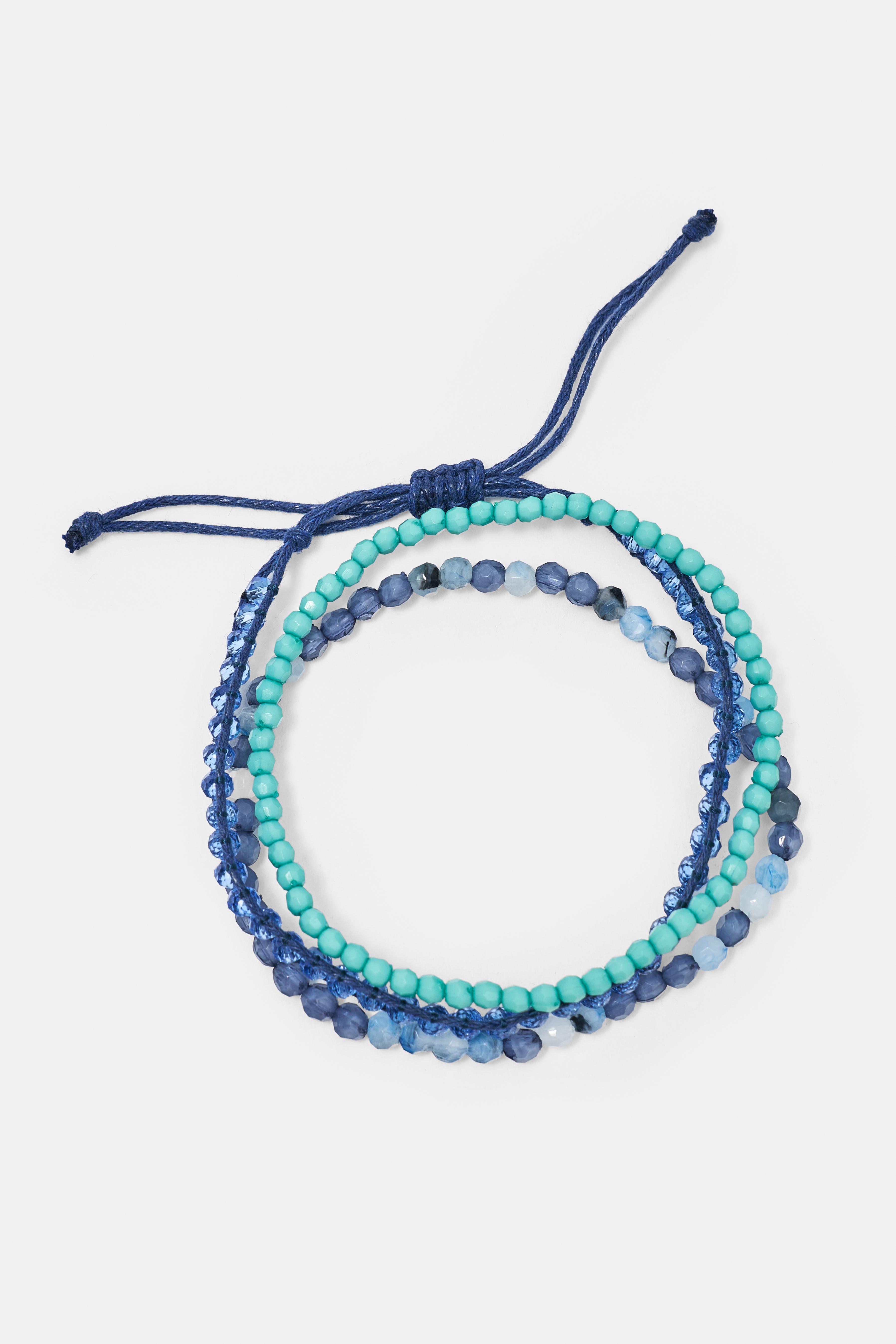 Pack of 7 fish charm bracelets — Blue