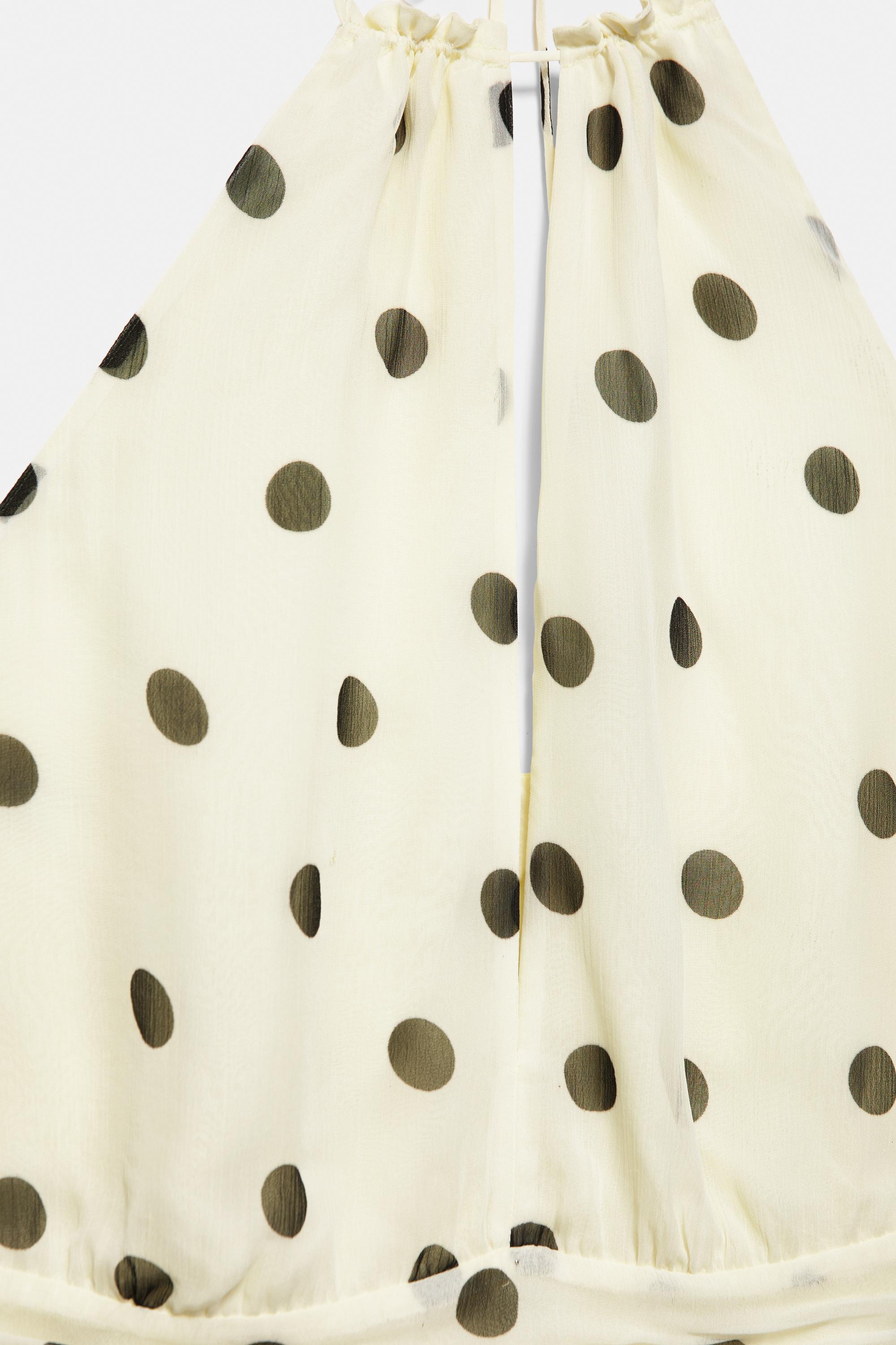 Polka dot halter top with cutout — White
