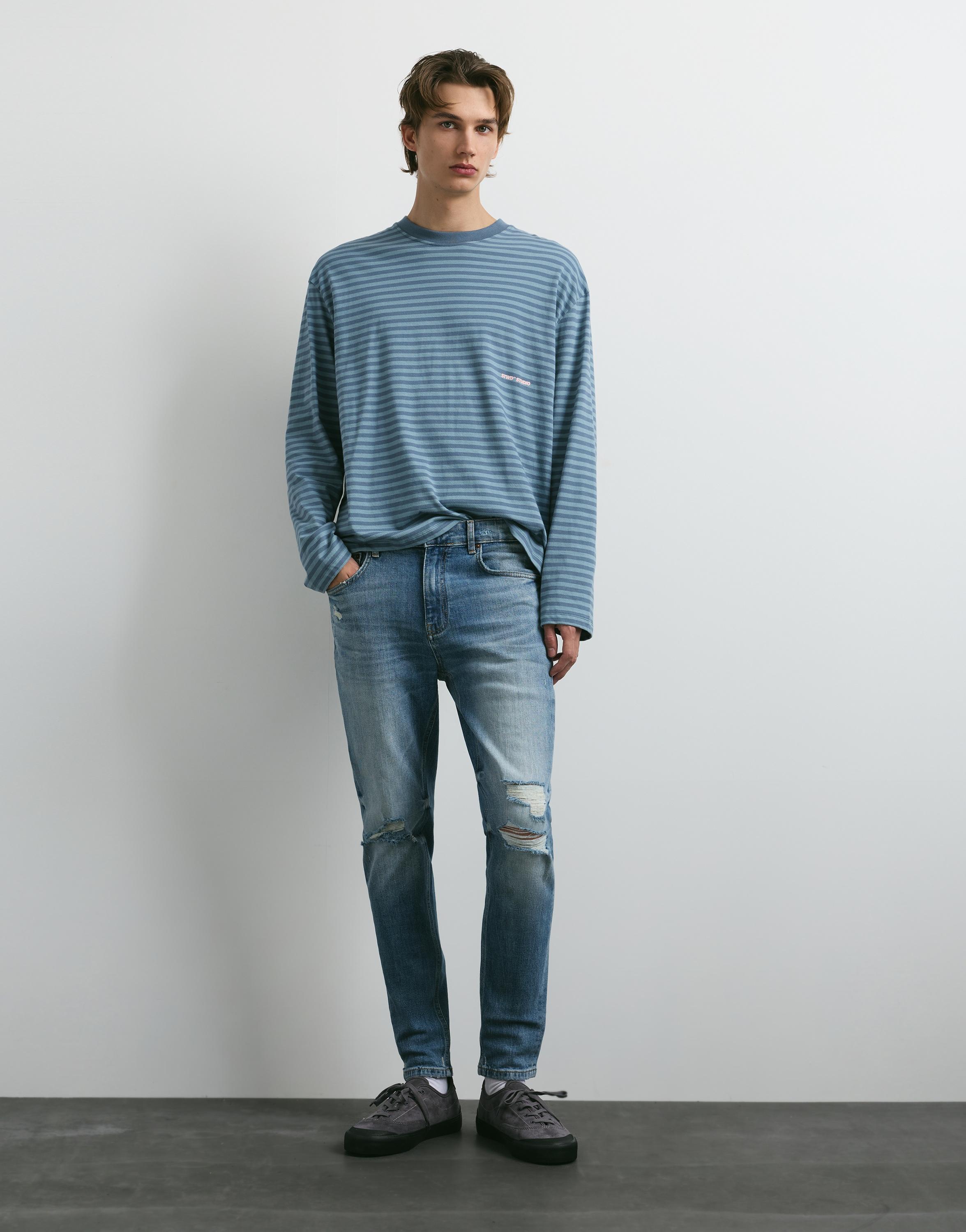 Ripped skinny jeans — Medium blue