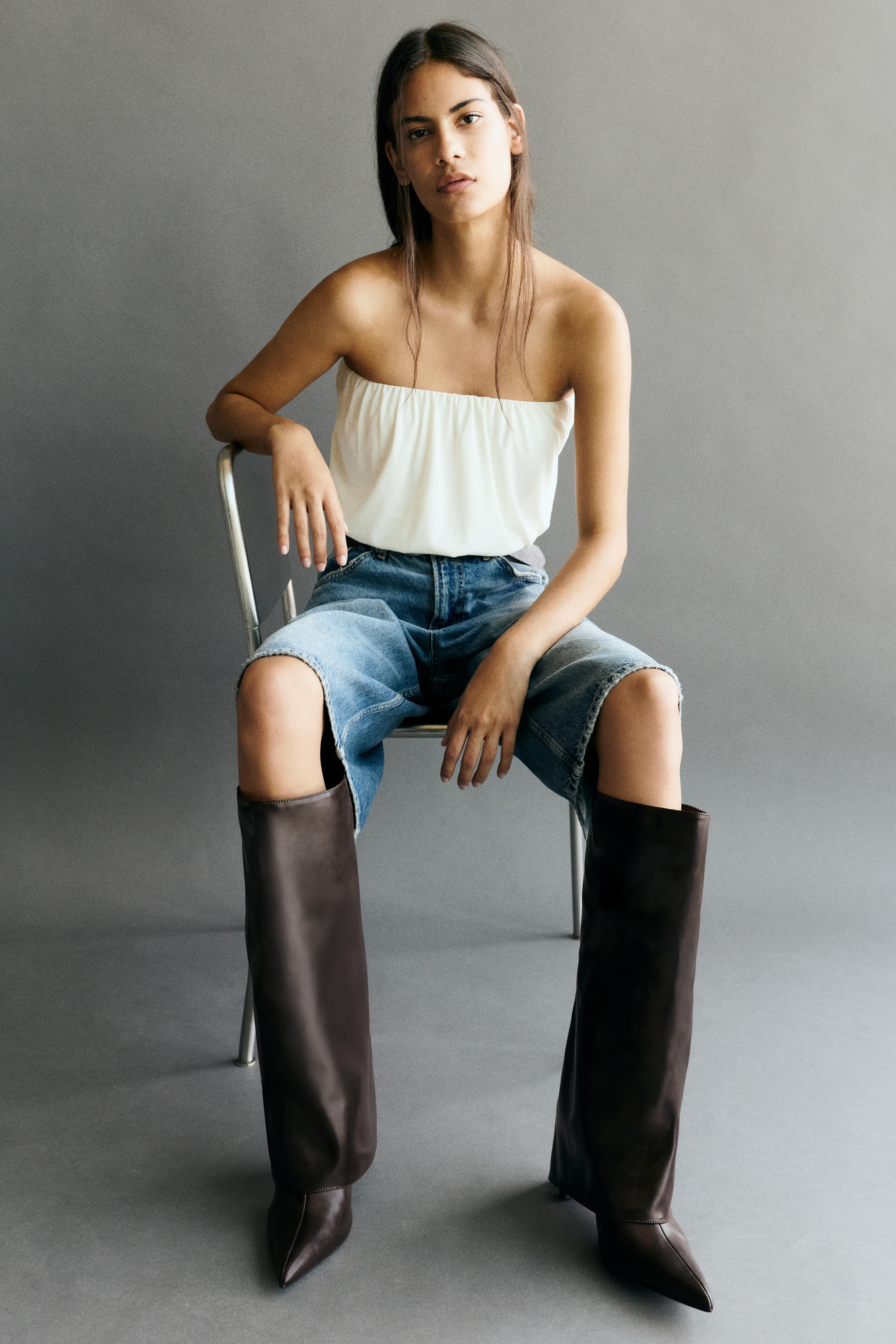 Heeled footed leggings boots — Brown