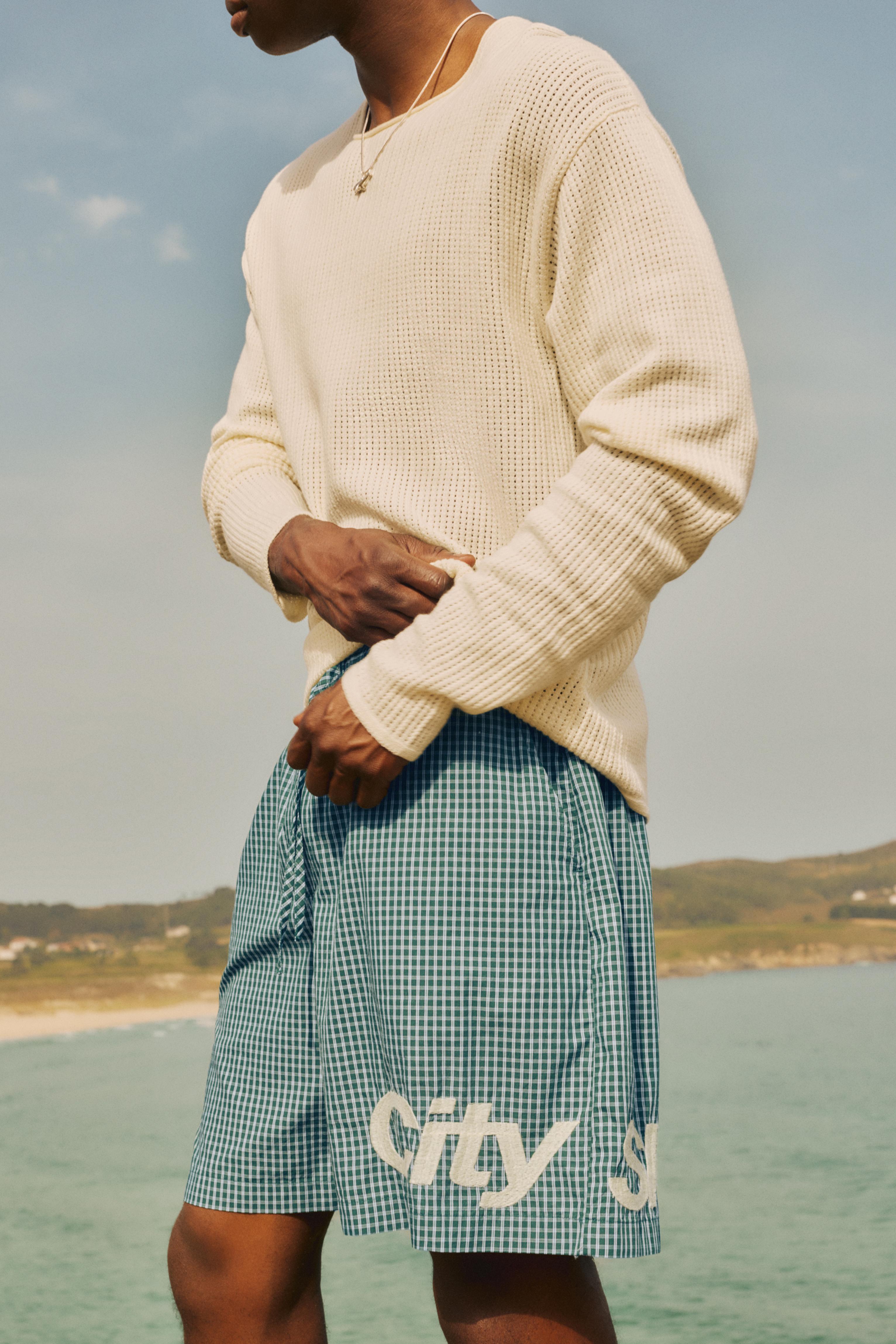 Checked graphic Bermuda shorts — Moss