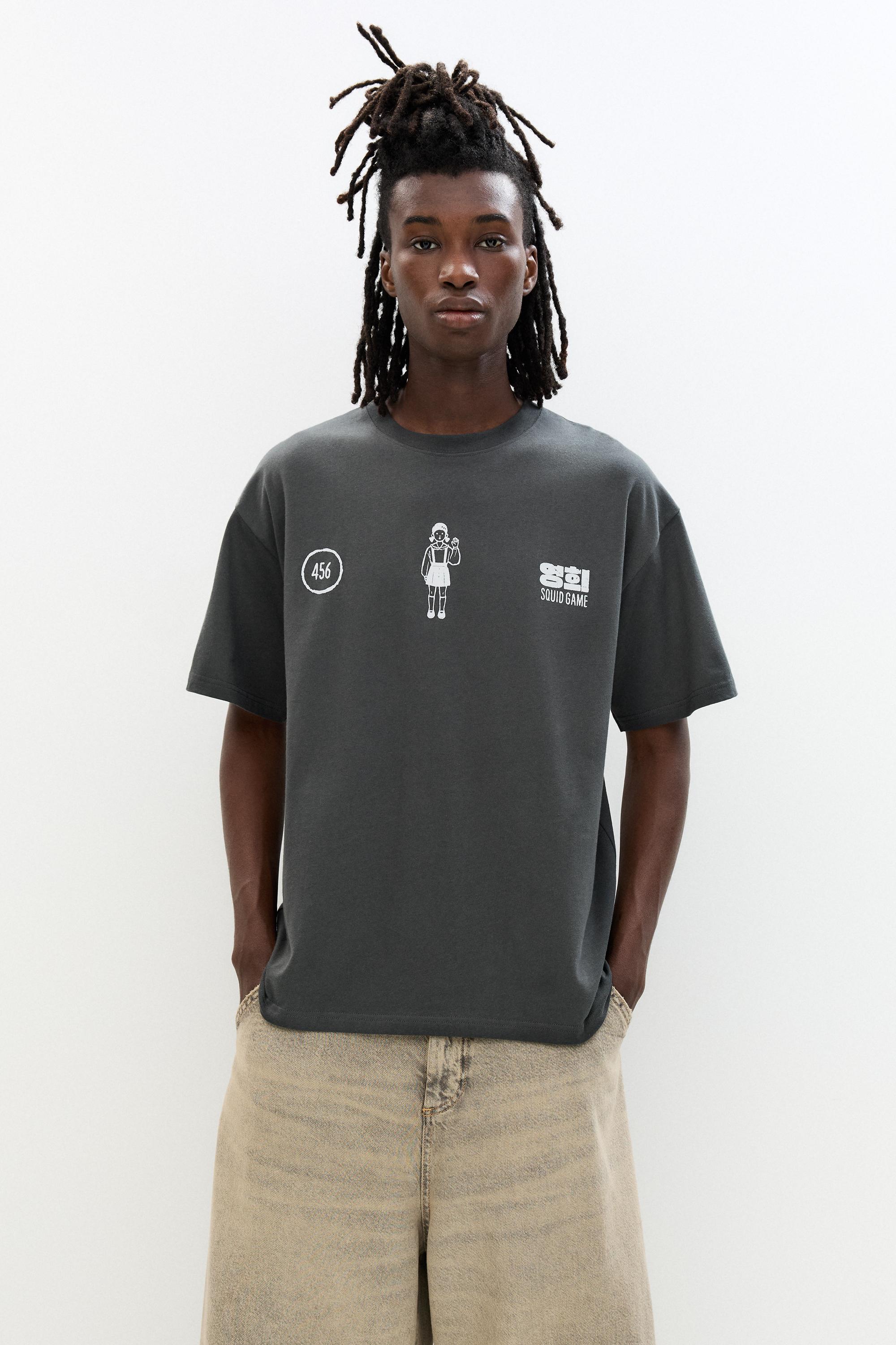 „Squid Game“-T-Shirt Mit Puppenmotiv