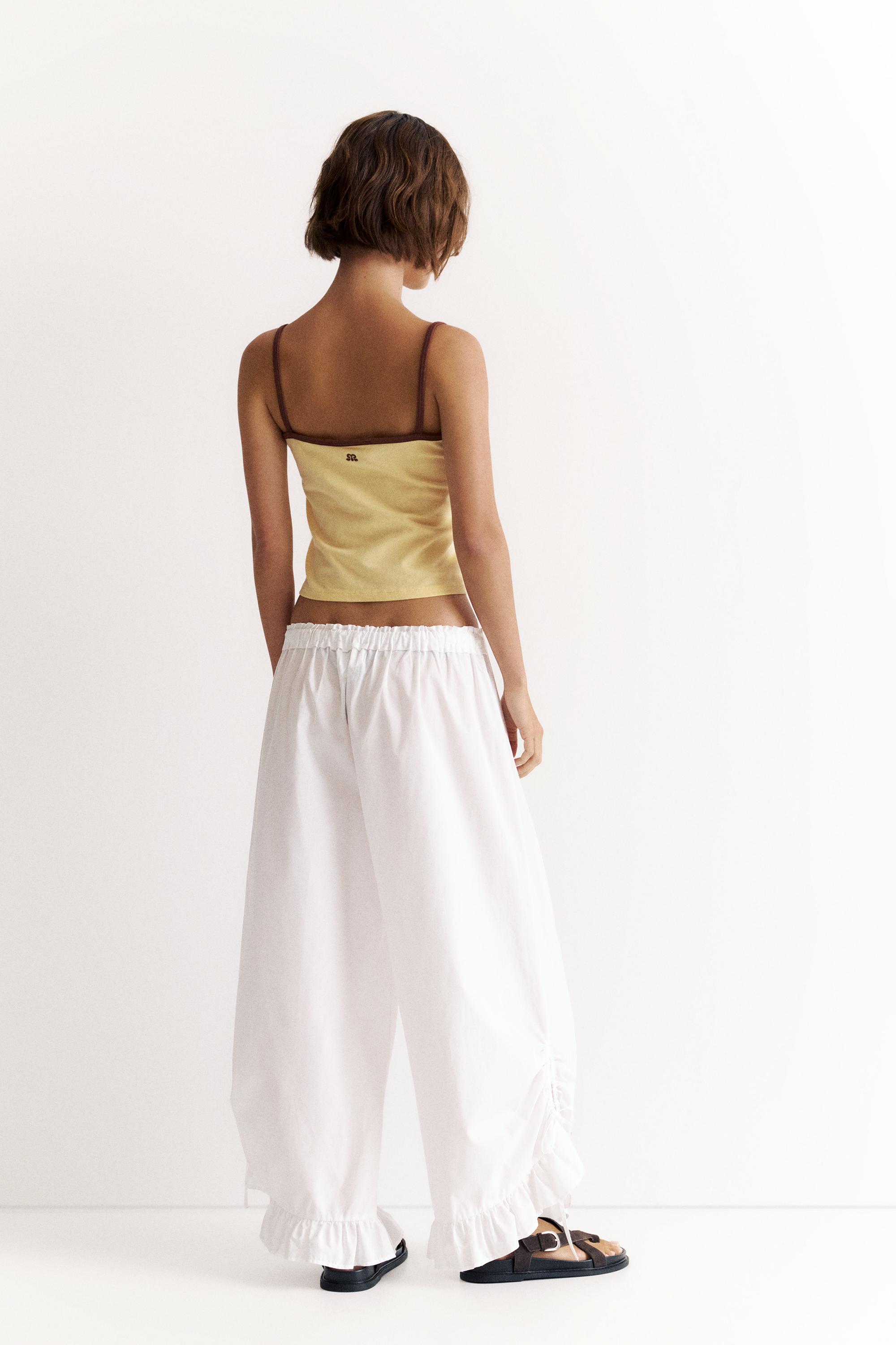 Hibiscus flower strappy top — Yellow