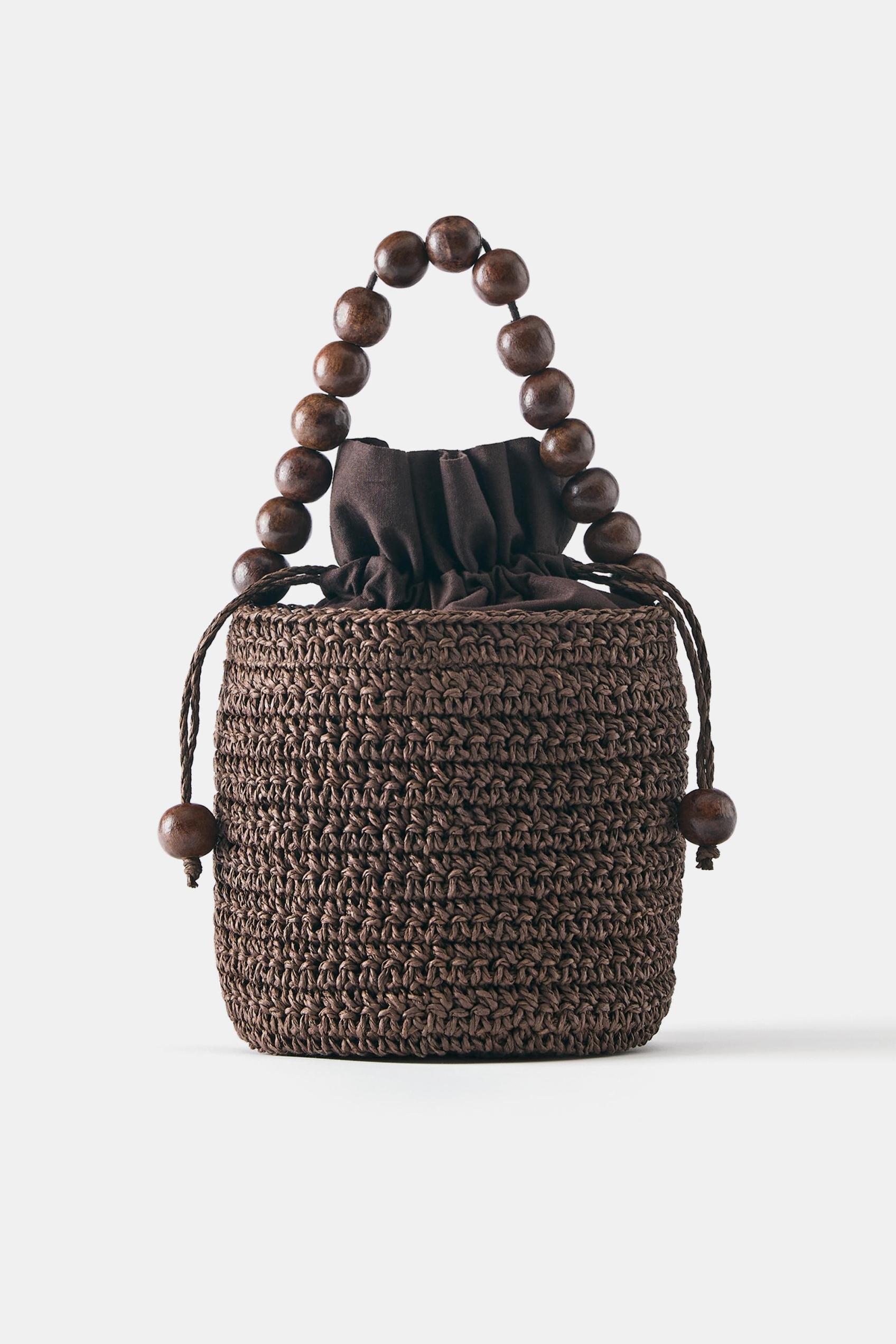 Beaded bucket handbag — Brown