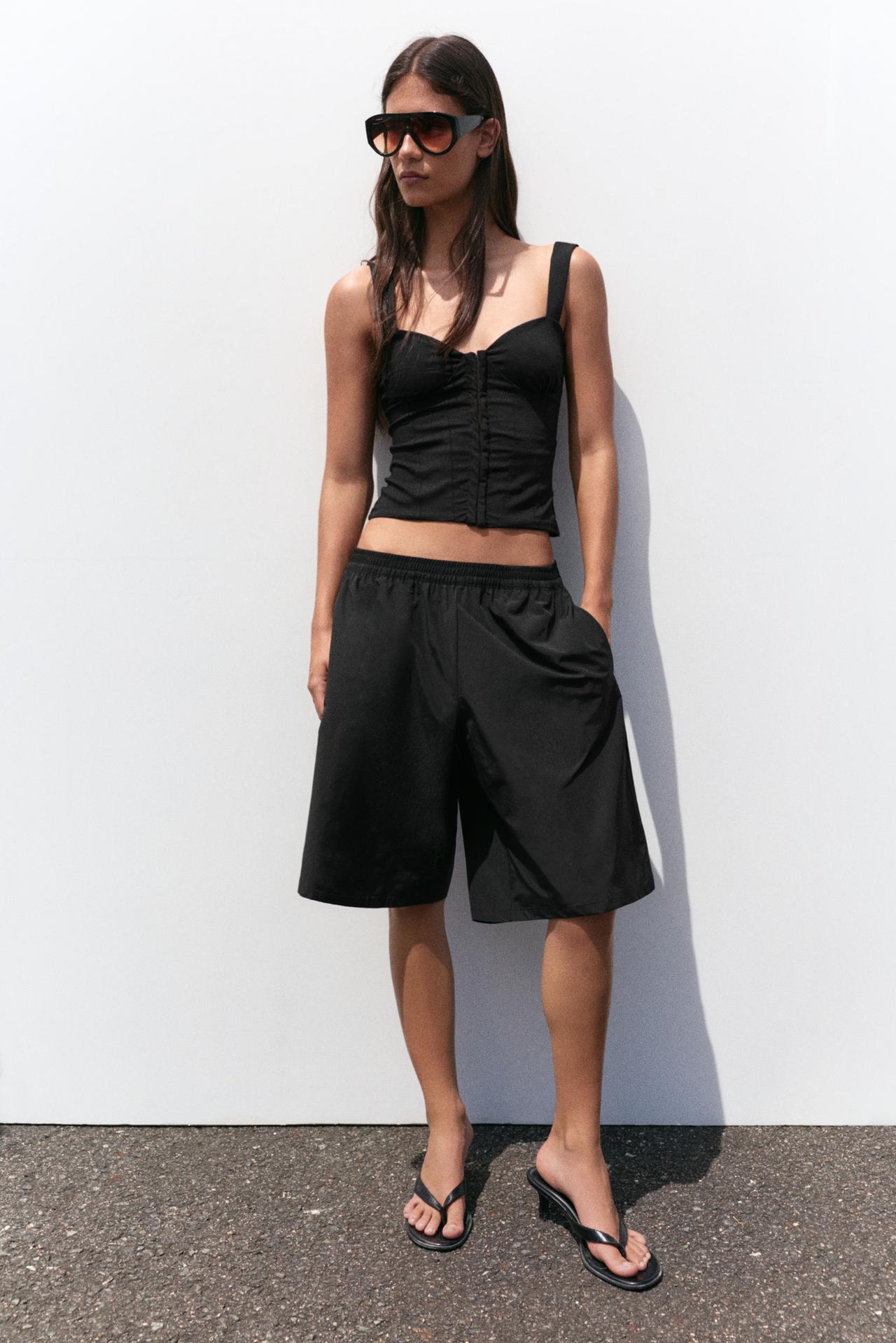 Strappy corsetry-inspired top — Black