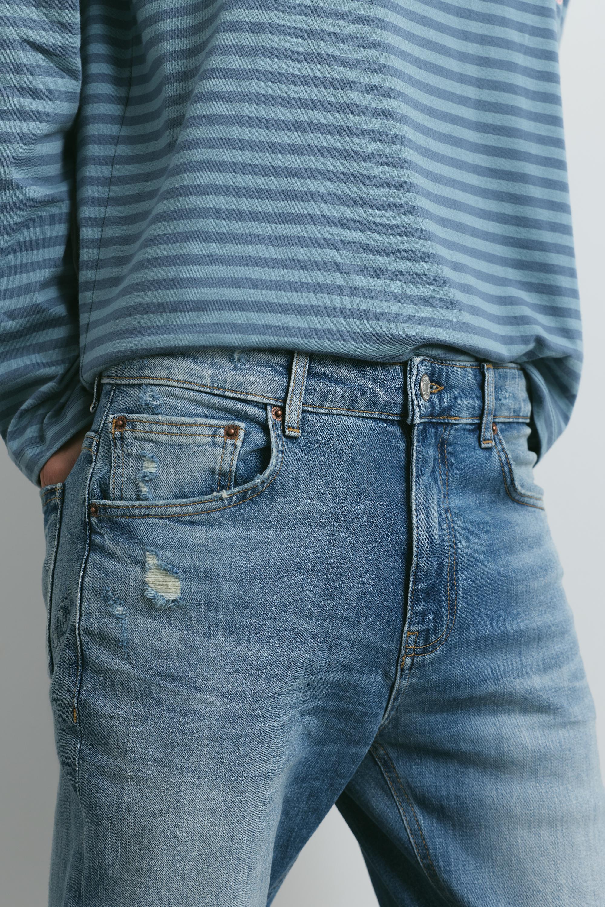 Ripped skinny jeans — Medium blue