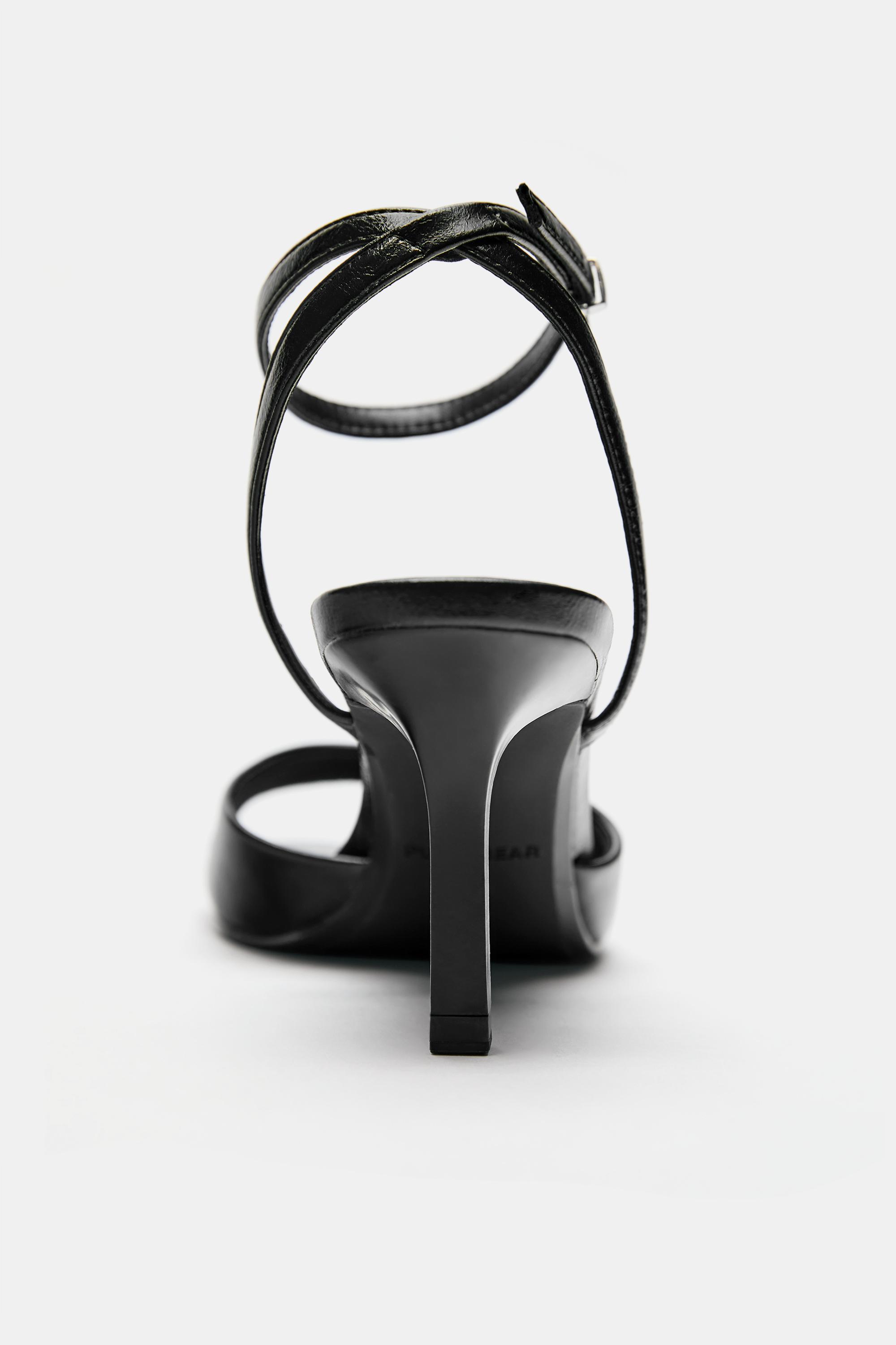 Heeled sandals — Black
