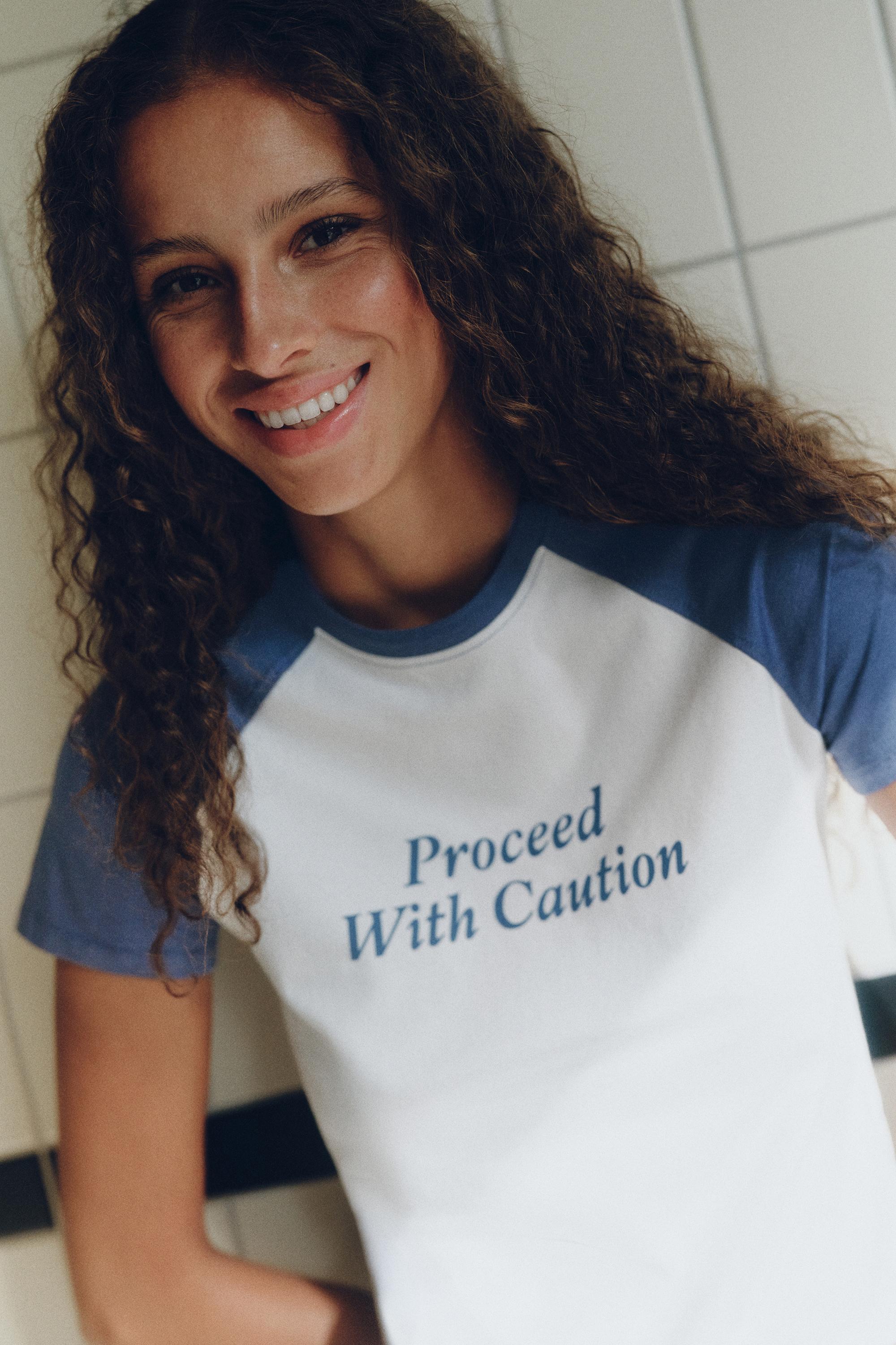 Raglan sleeve slogan T-shirt — Ice