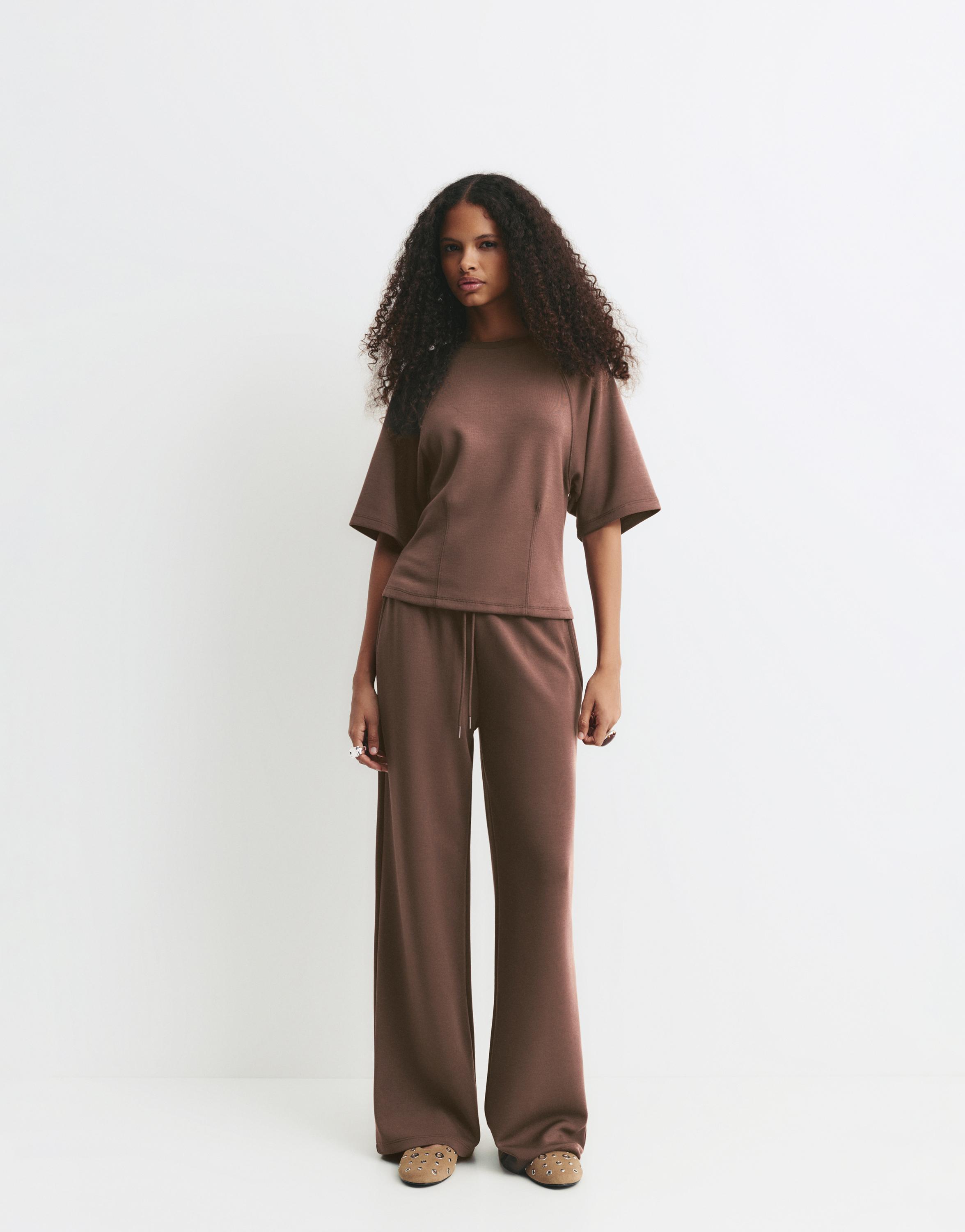 Soft-touch wide-leg trousers — Brown