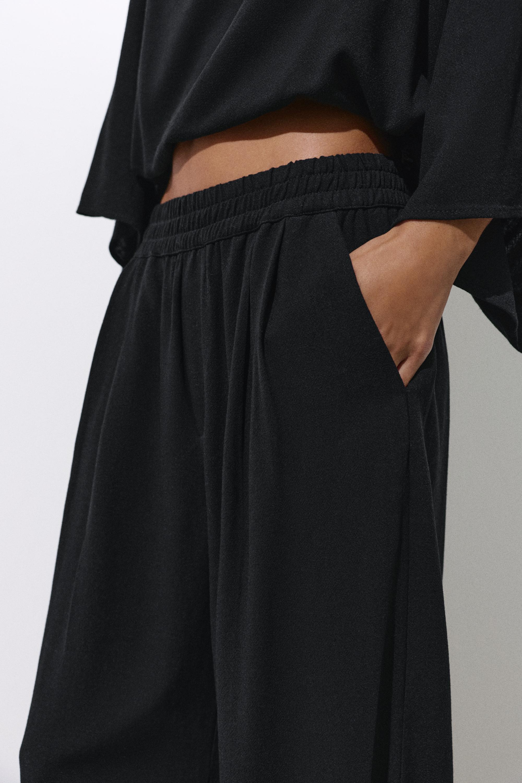 Flowing darted trousers — Black