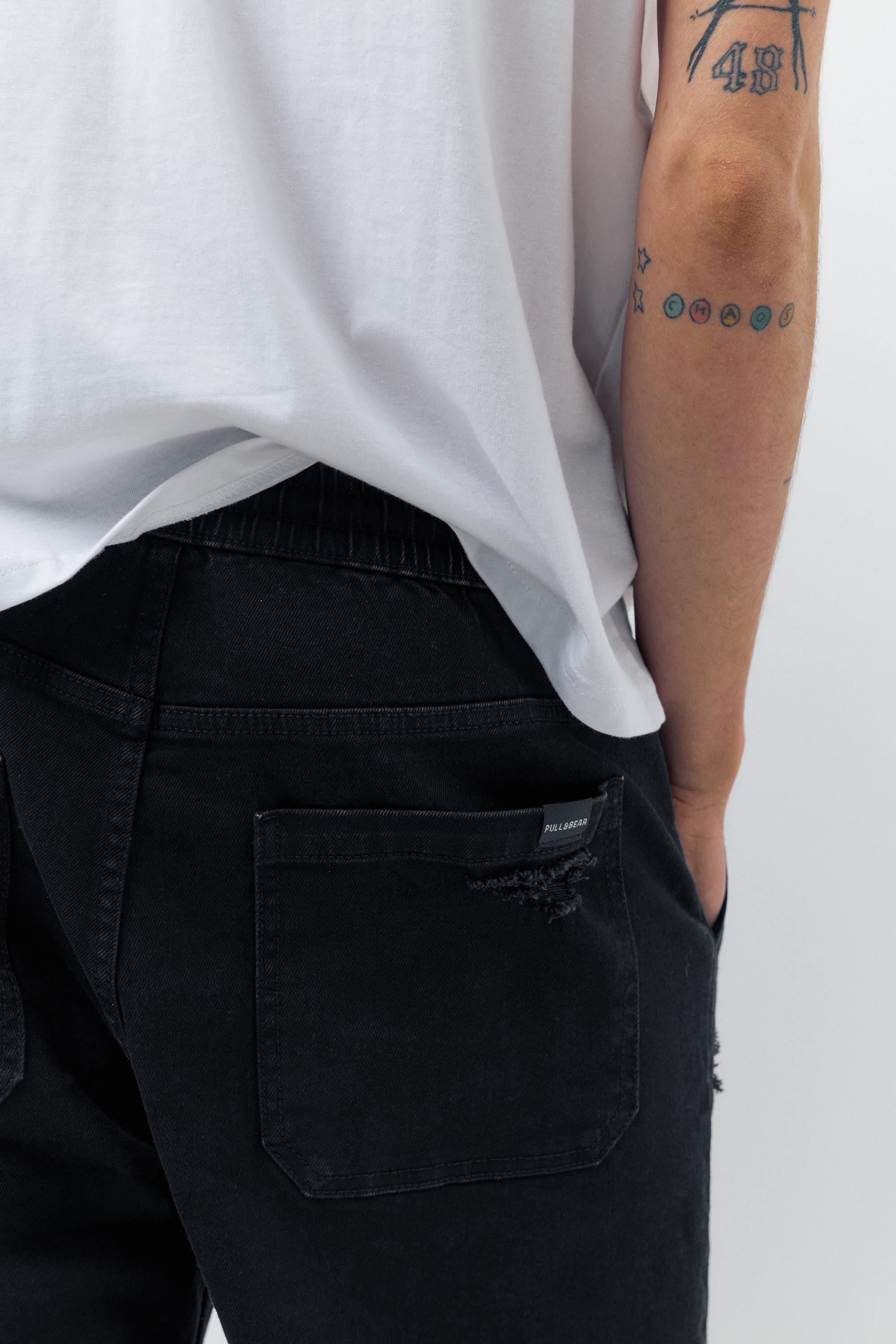 Ripped denim jogger trousers — Black
