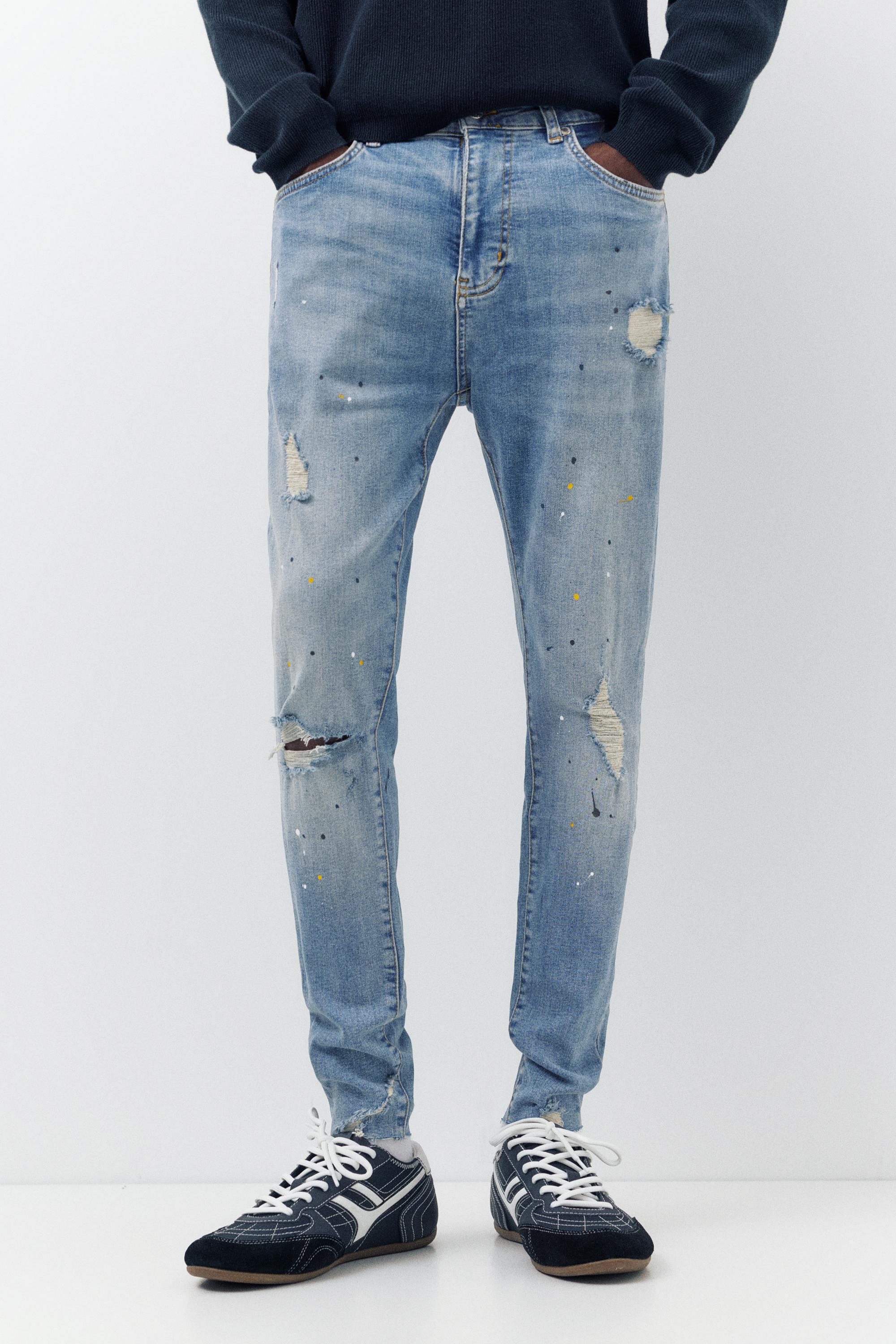 Paint splatter carrot-fit jeans — Medium blue