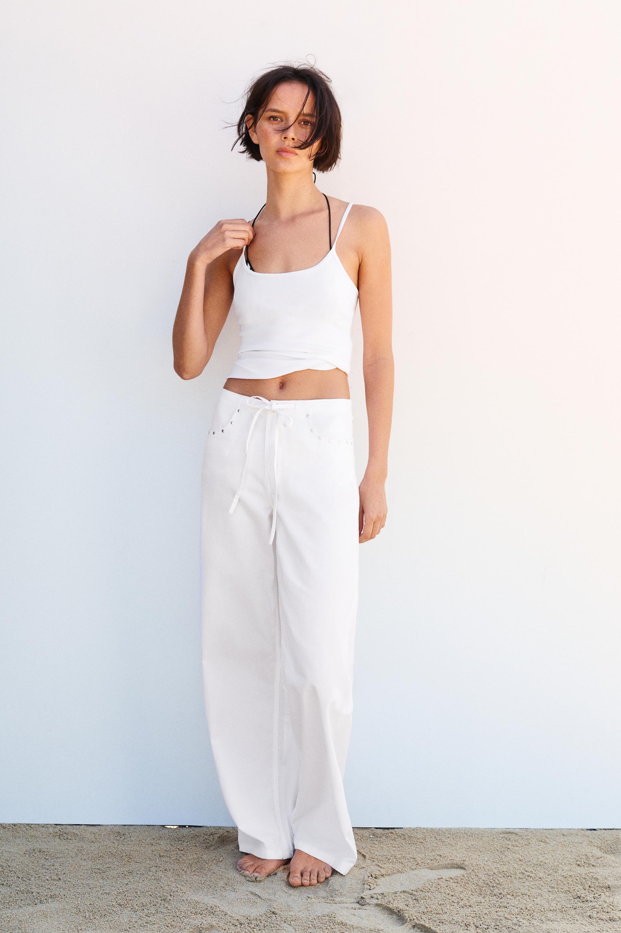 White studded baggy jeans — White