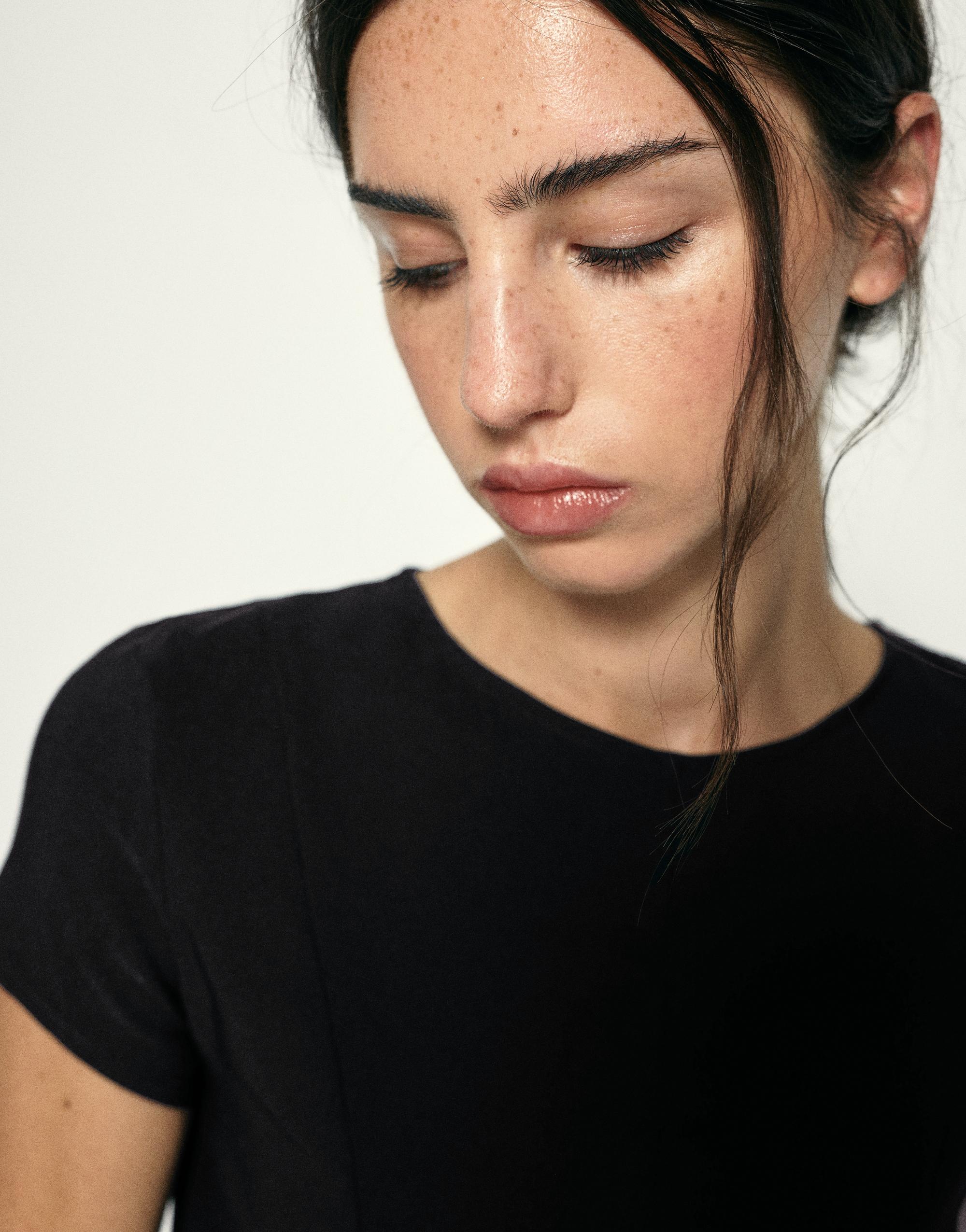 Peplum top — Black