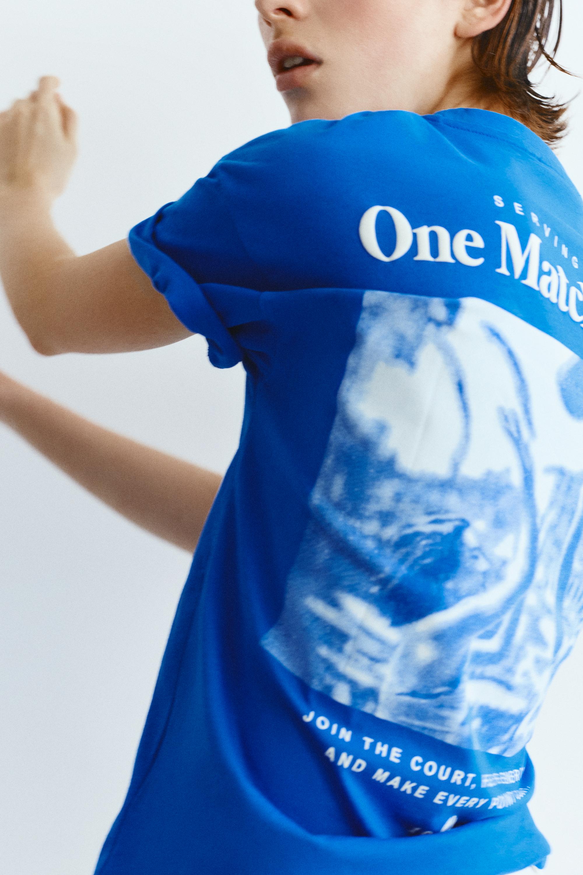 Maglietta Blu Con Scritta