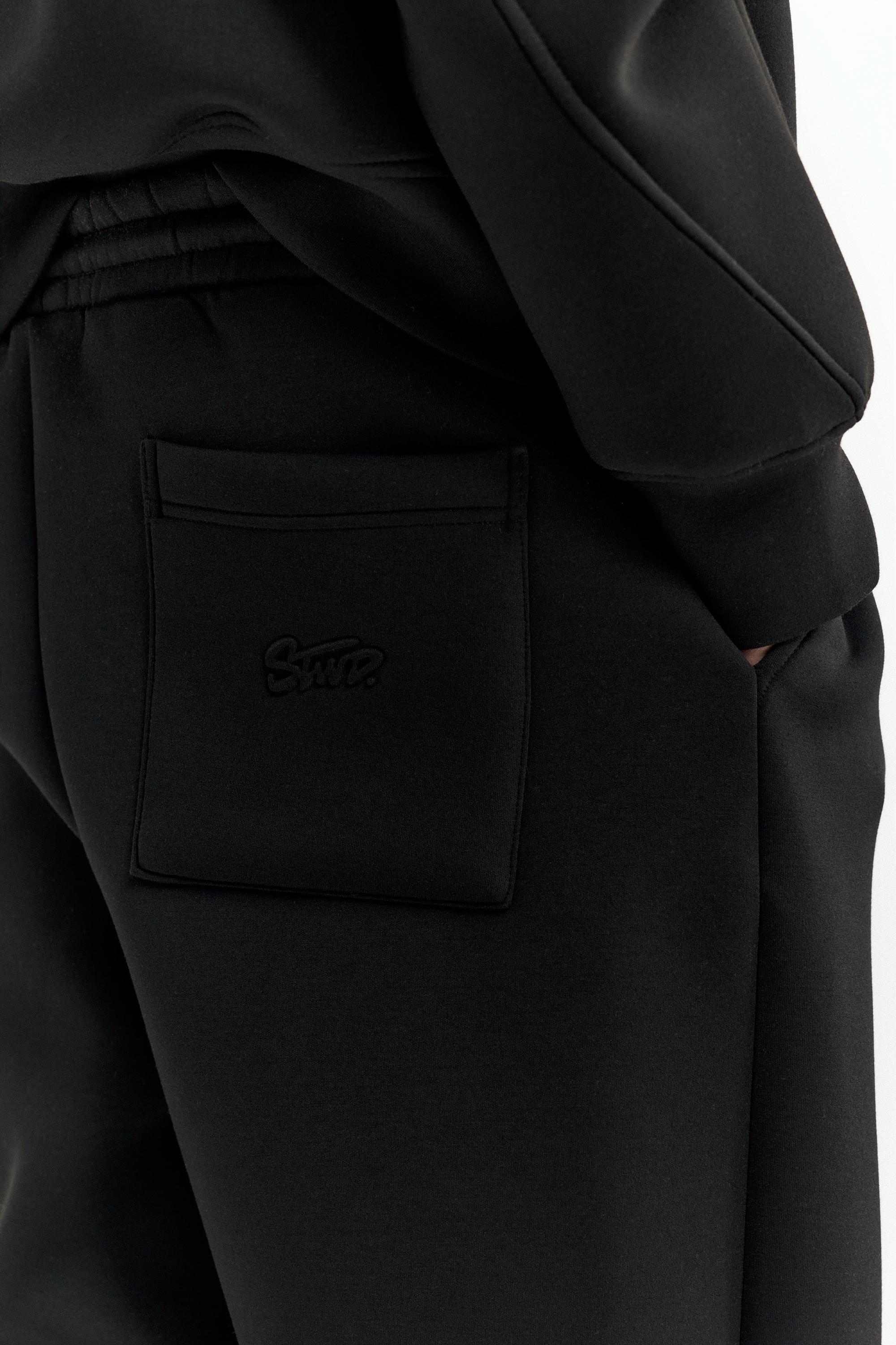 Neoprene-effect baggy trousers — Black