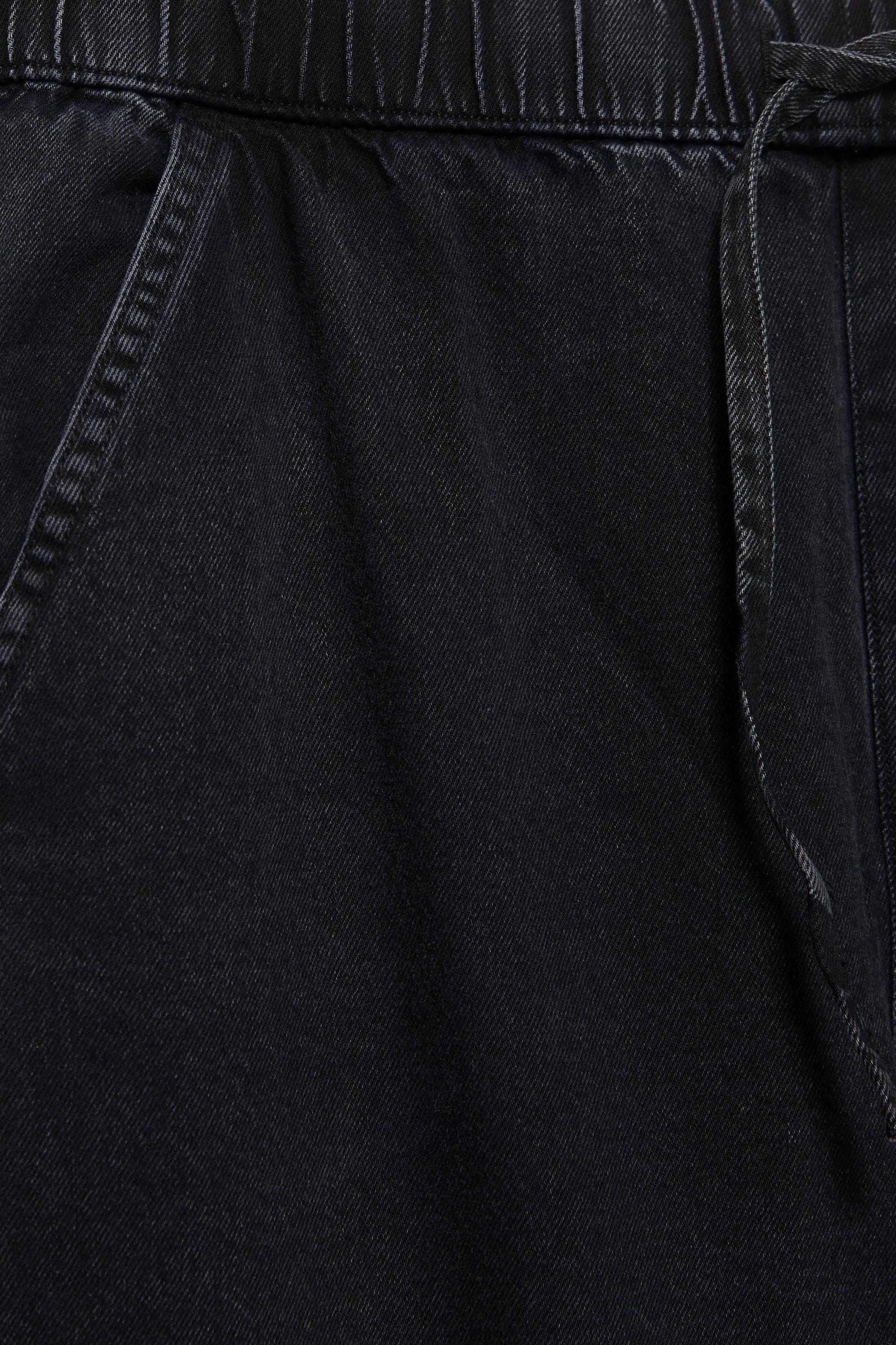 Slouchy mid-waist jeans — Black