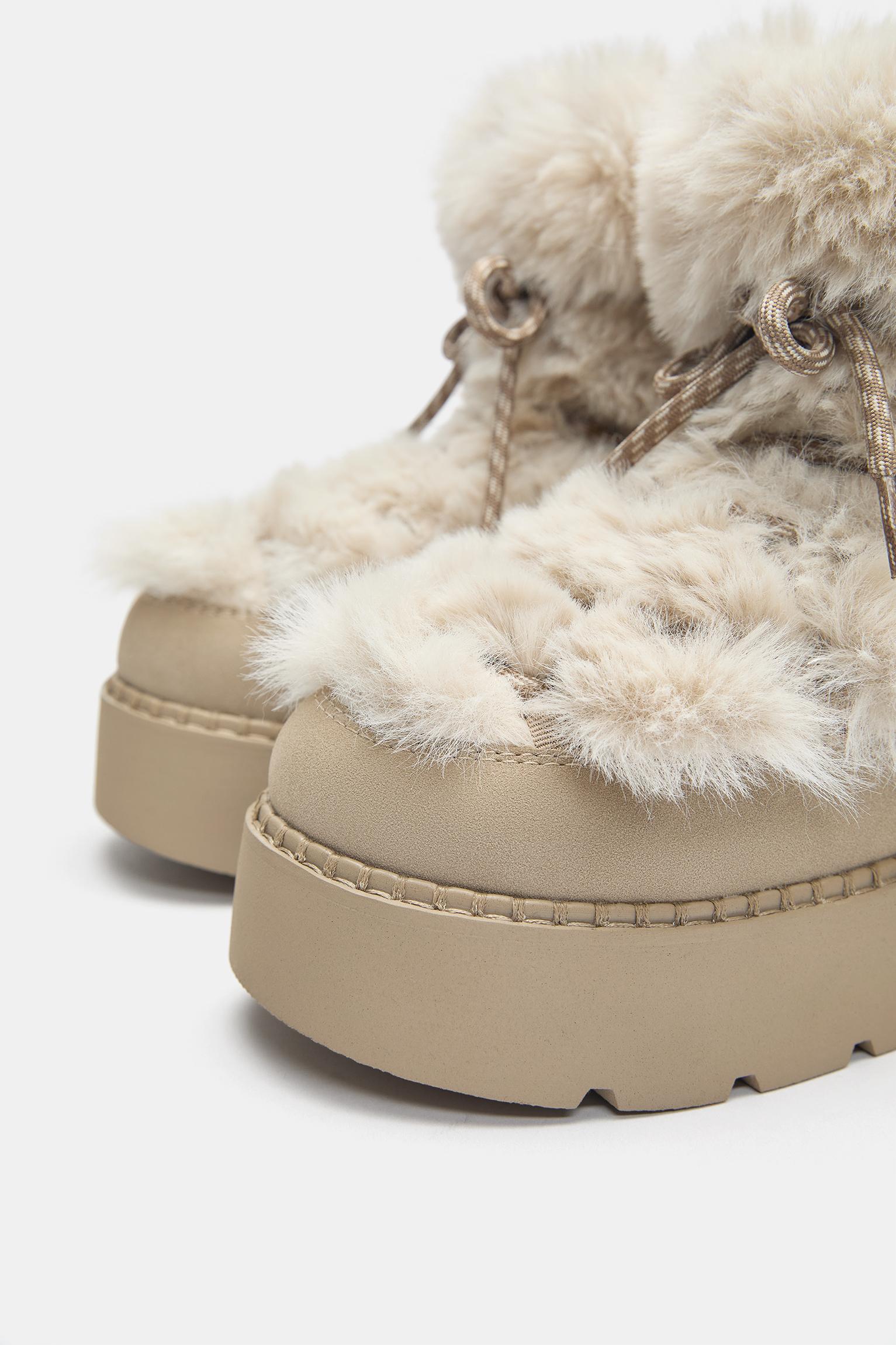 Flat faux fur boots — Ecru