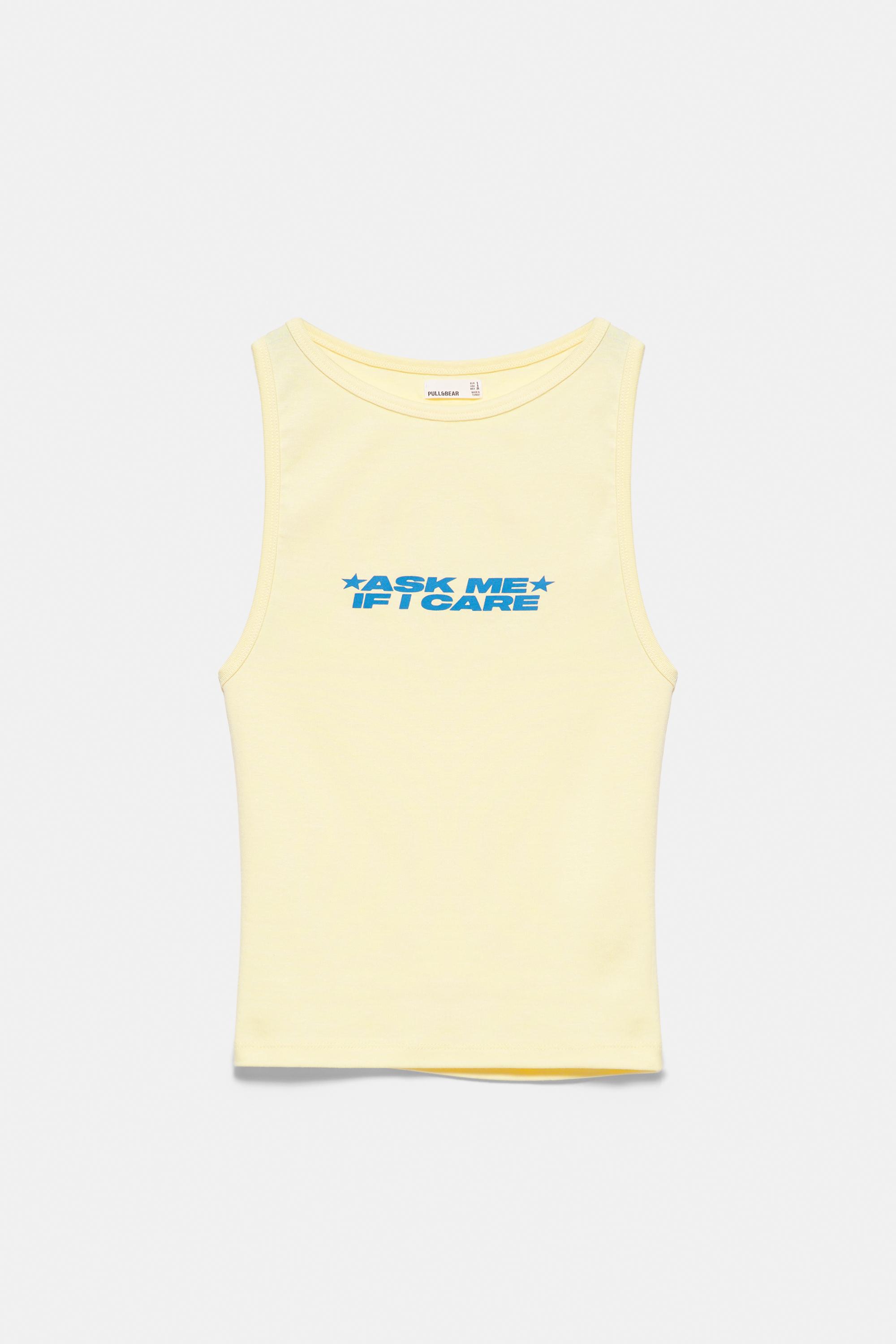 Yellow slogan tank top — Pale yellow