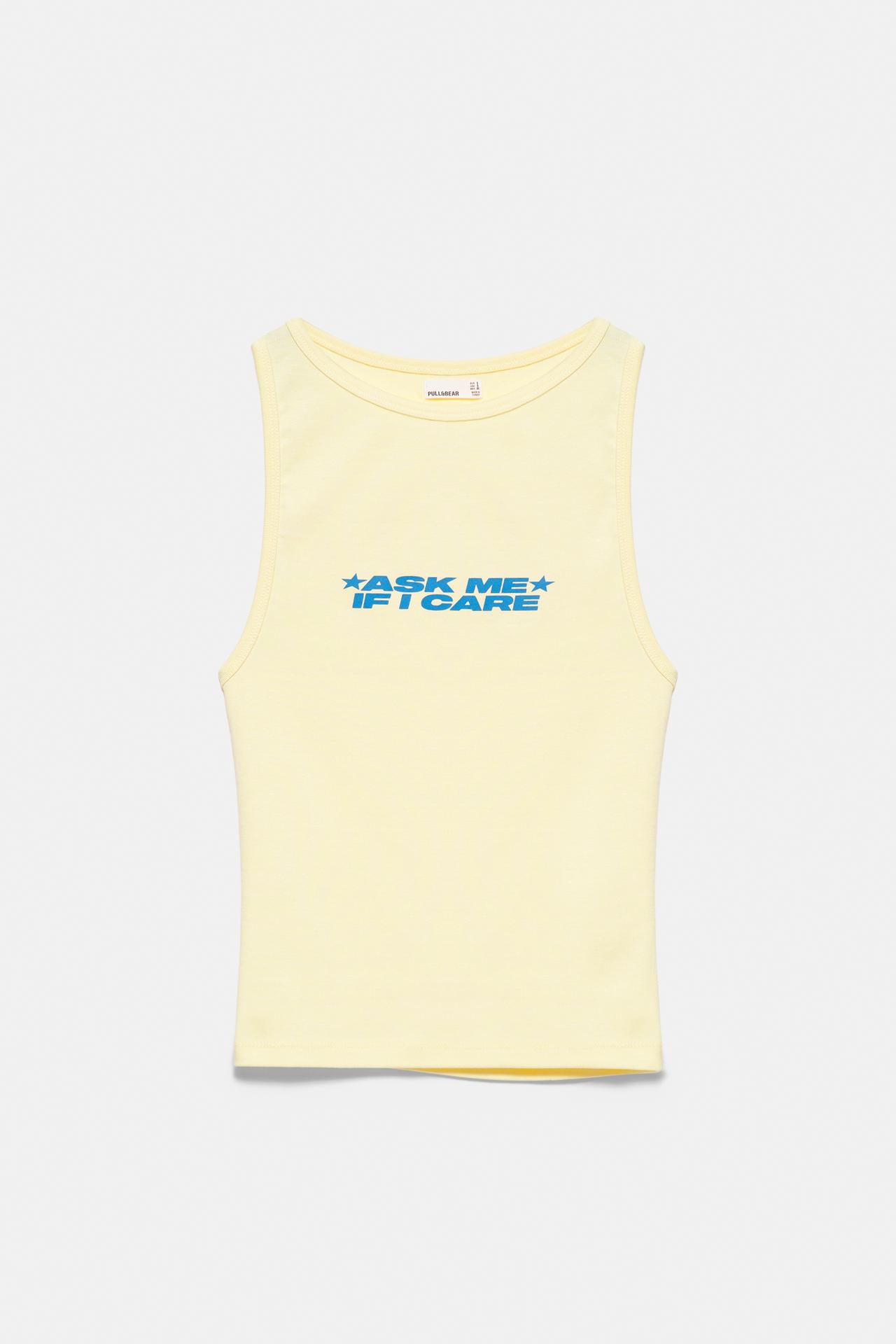 Yellow slogan tank top — Pale yellow
