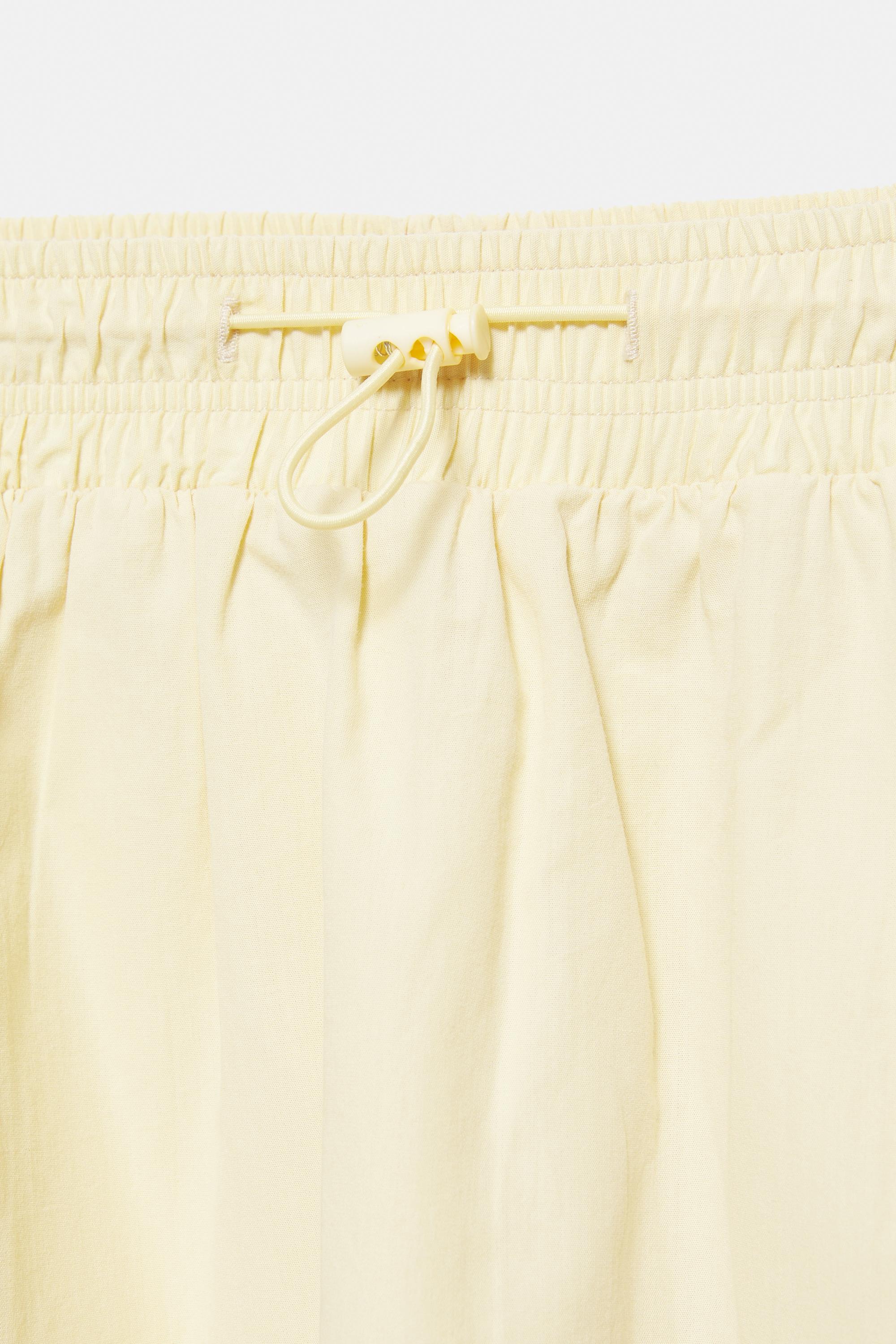 Technical mini skirt with stopper — Vanilla