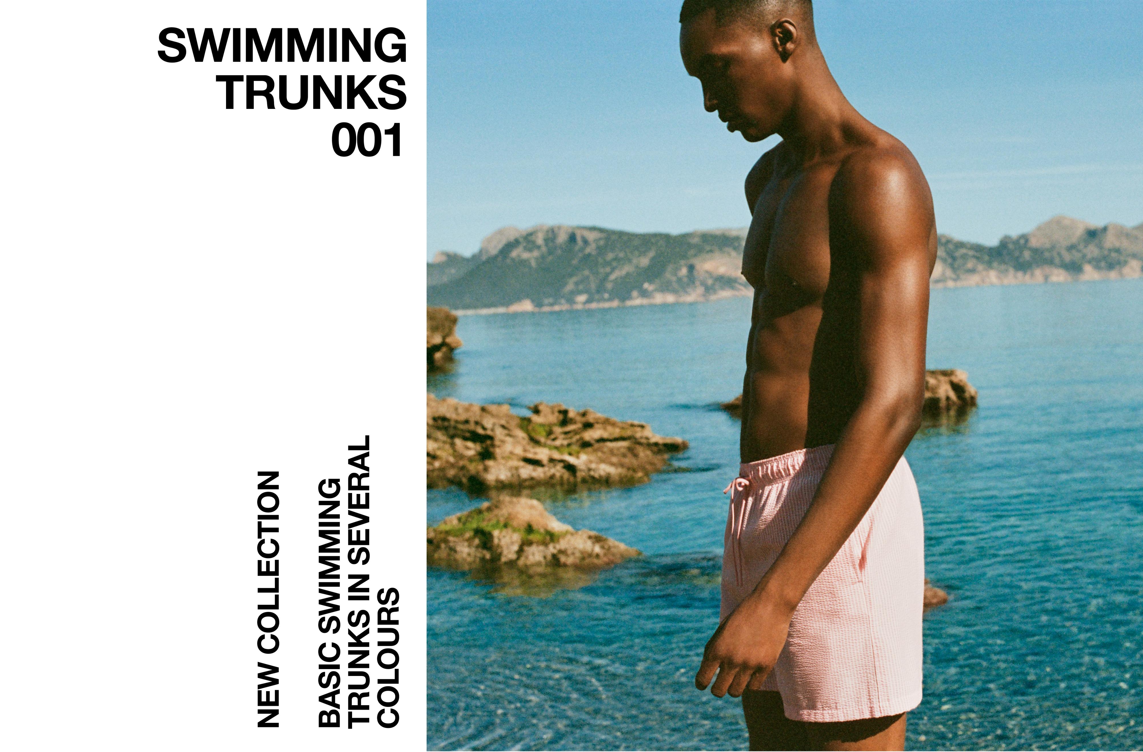Striped seersucker swimming trunks — Pink