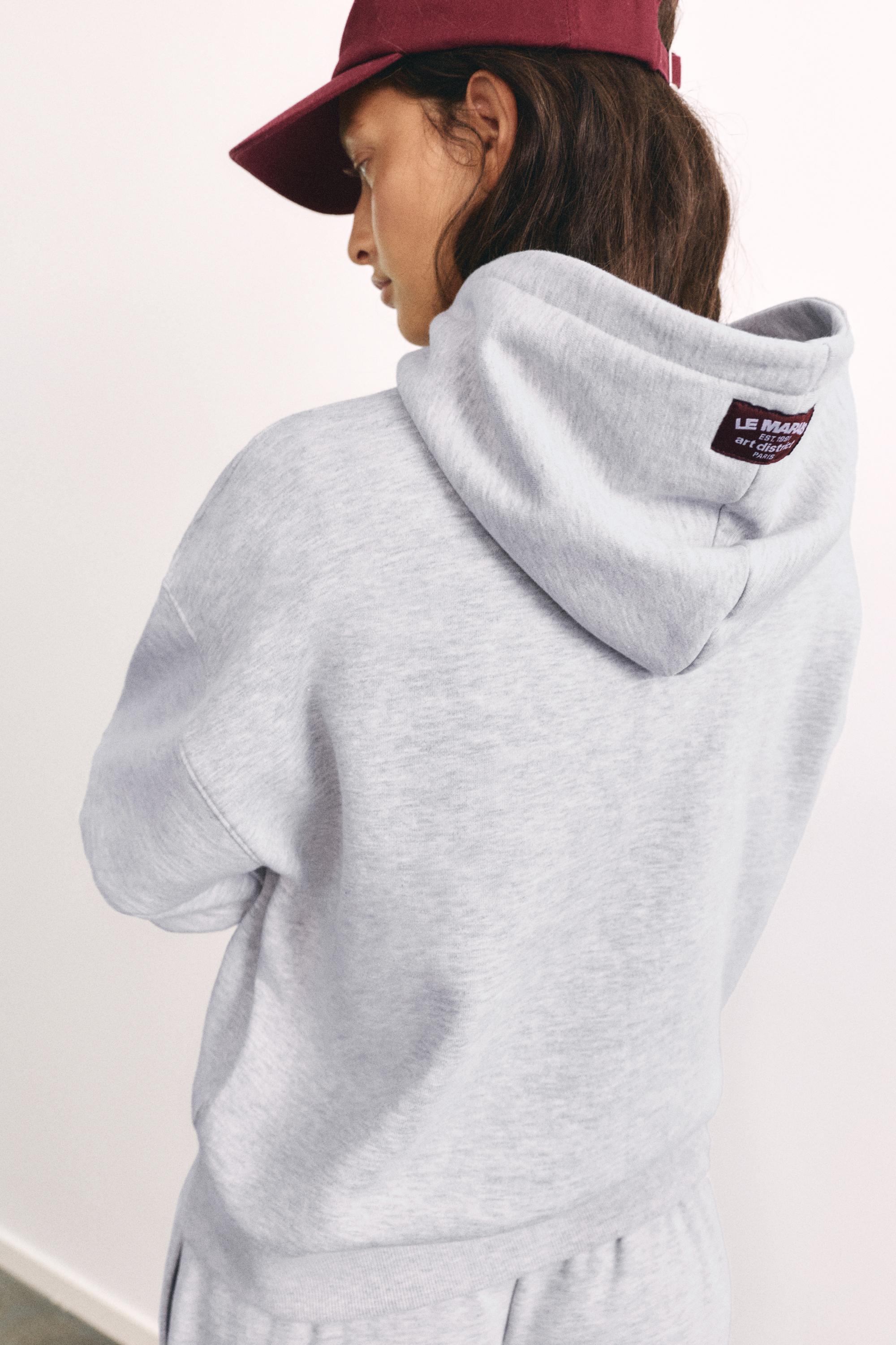 Graphic hoodie — Grey marl
