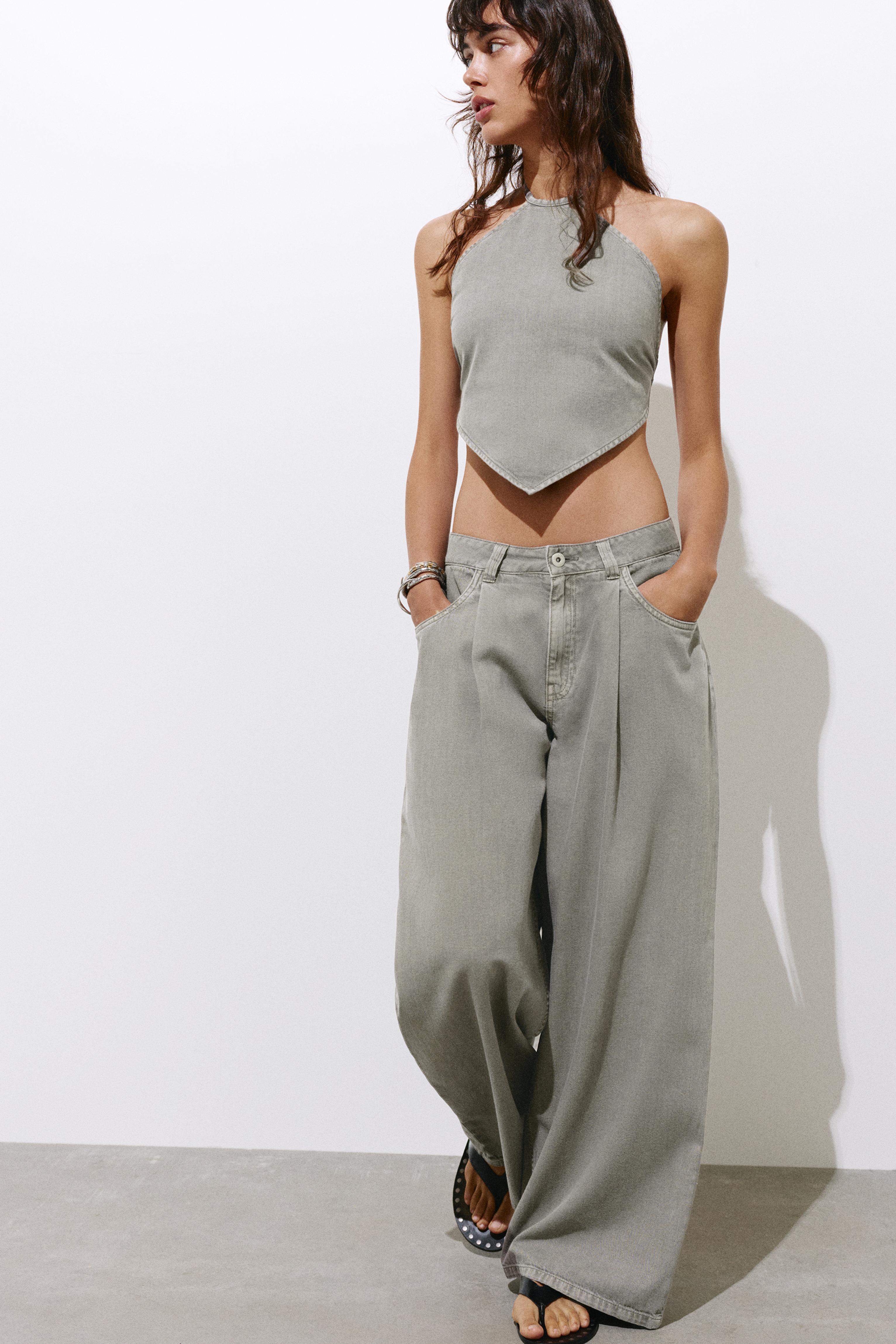 Jeans Gamba Larga Con Pince